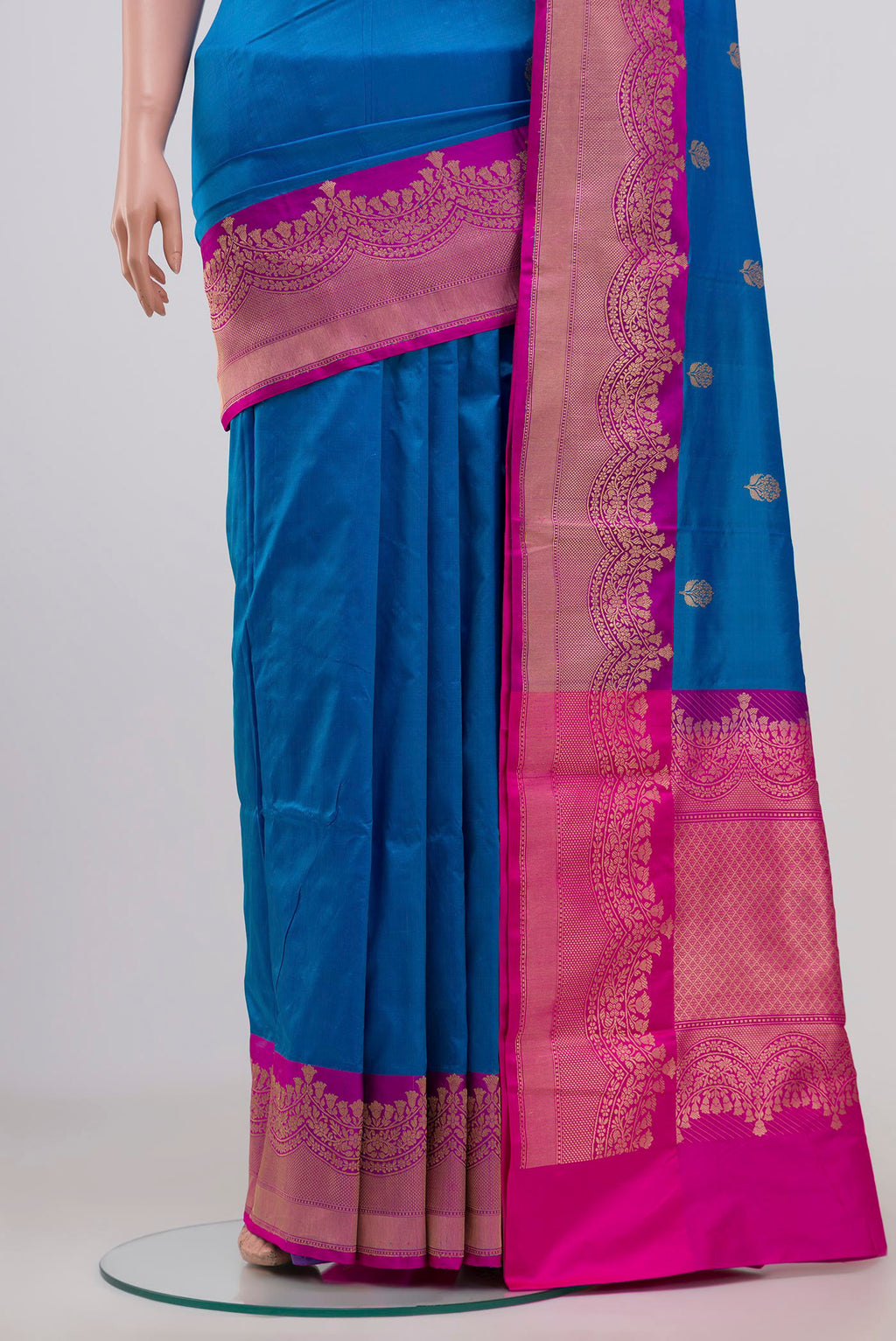 Pleats and pallu of Blue Banarasi Katan Silk Saree with Zari Butta on the body and Zari Border. 