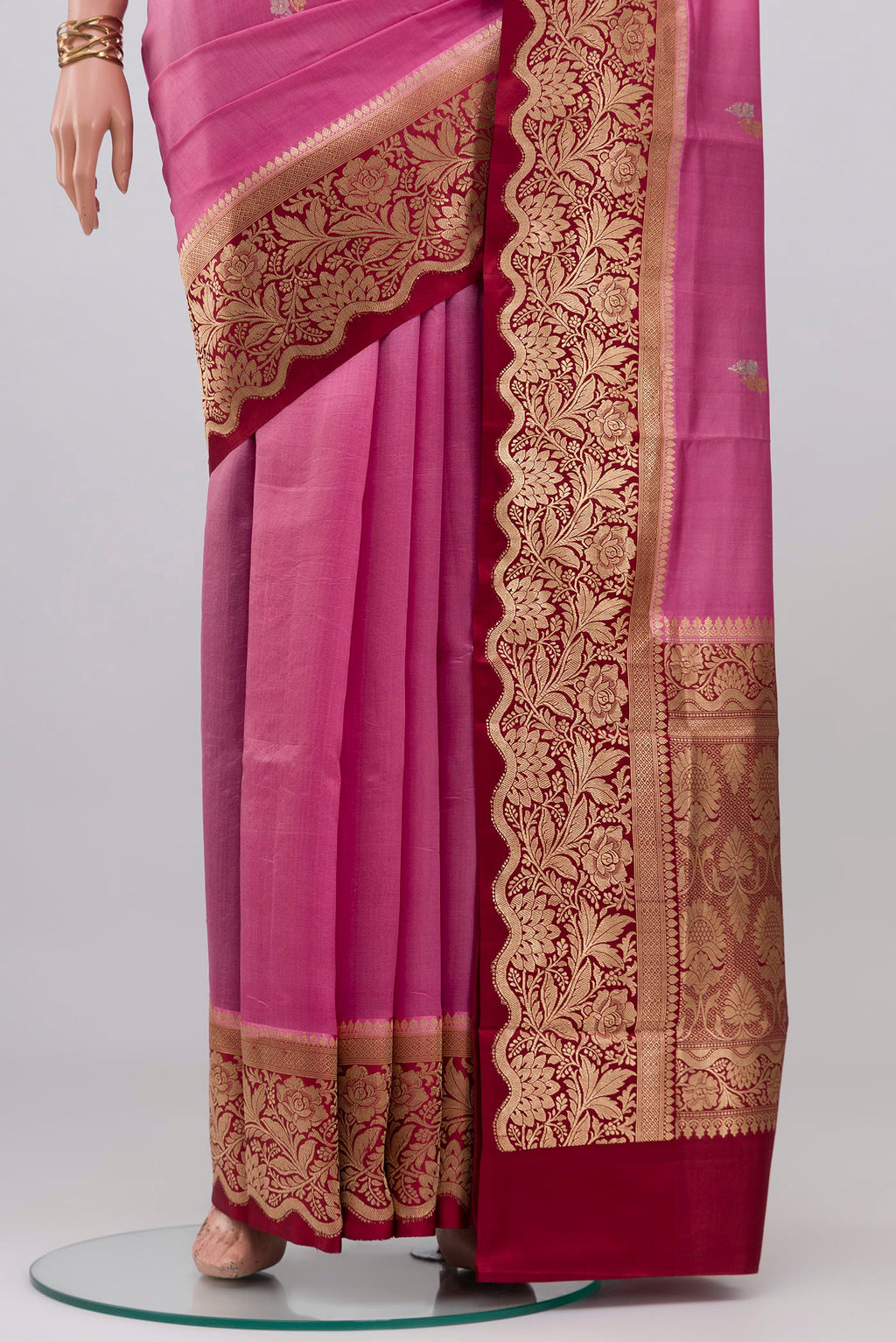 Pleats and pallu of Pink Banarasi Katan Silk Saree with Zari Butta on the body and Zari Border. 