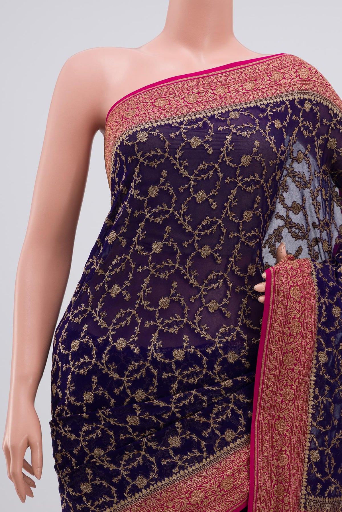 Border image of Blue Georgette Saree with Fancy on the body and Zari Border. 