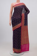 Blue Georgette Saree with Fancy on the body and Zari Border.  displayed on a mannequin