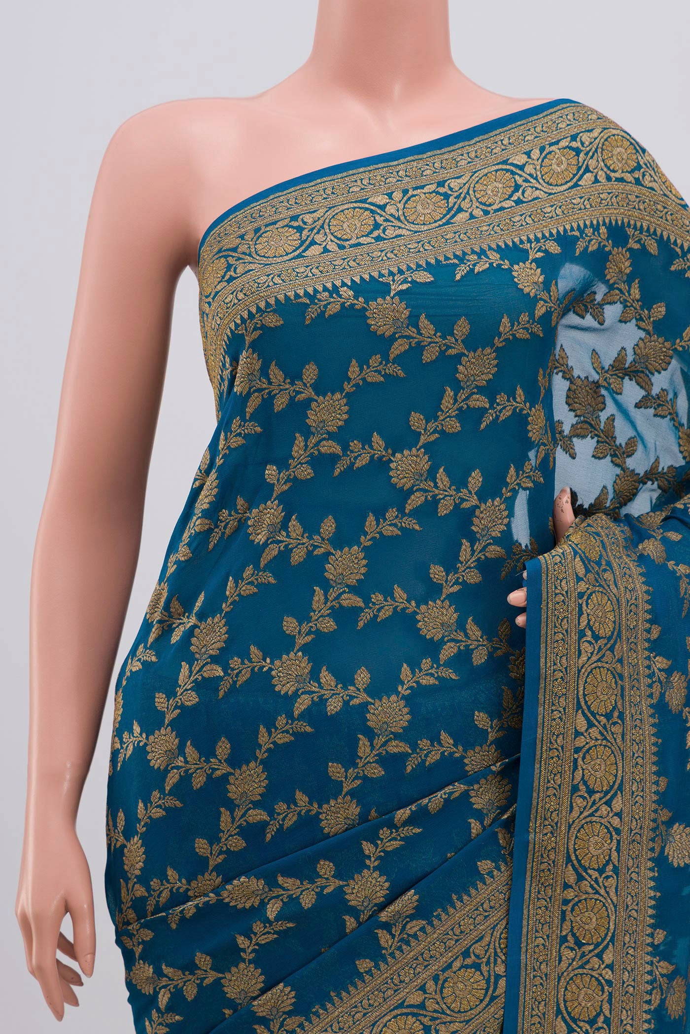 Border image of Blue Banarasi Georgette Saree with Fancy on the body and Zari Border. 
