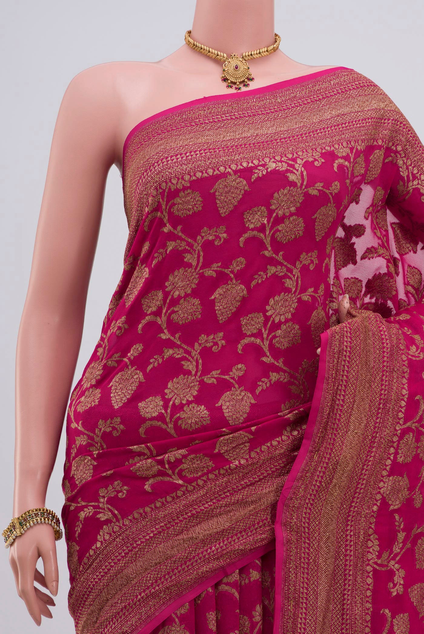 Border image of Pink Georgette Saree with Fancy on the body and Zari Border. 