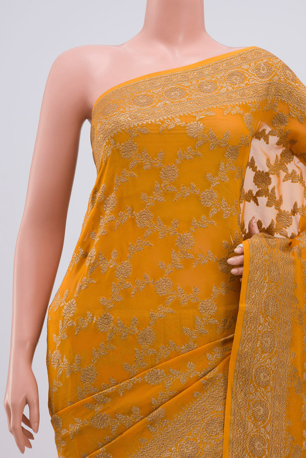 Border image of Yellow Banarasi Georgette Saree with Fancy on the body and Zari Border. 