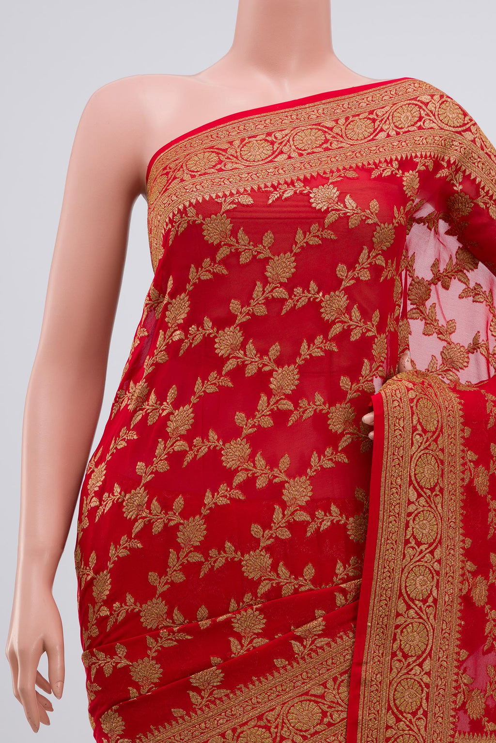 Border image of Red Georgette Saree with Fancy on the body and Zari Border. 
