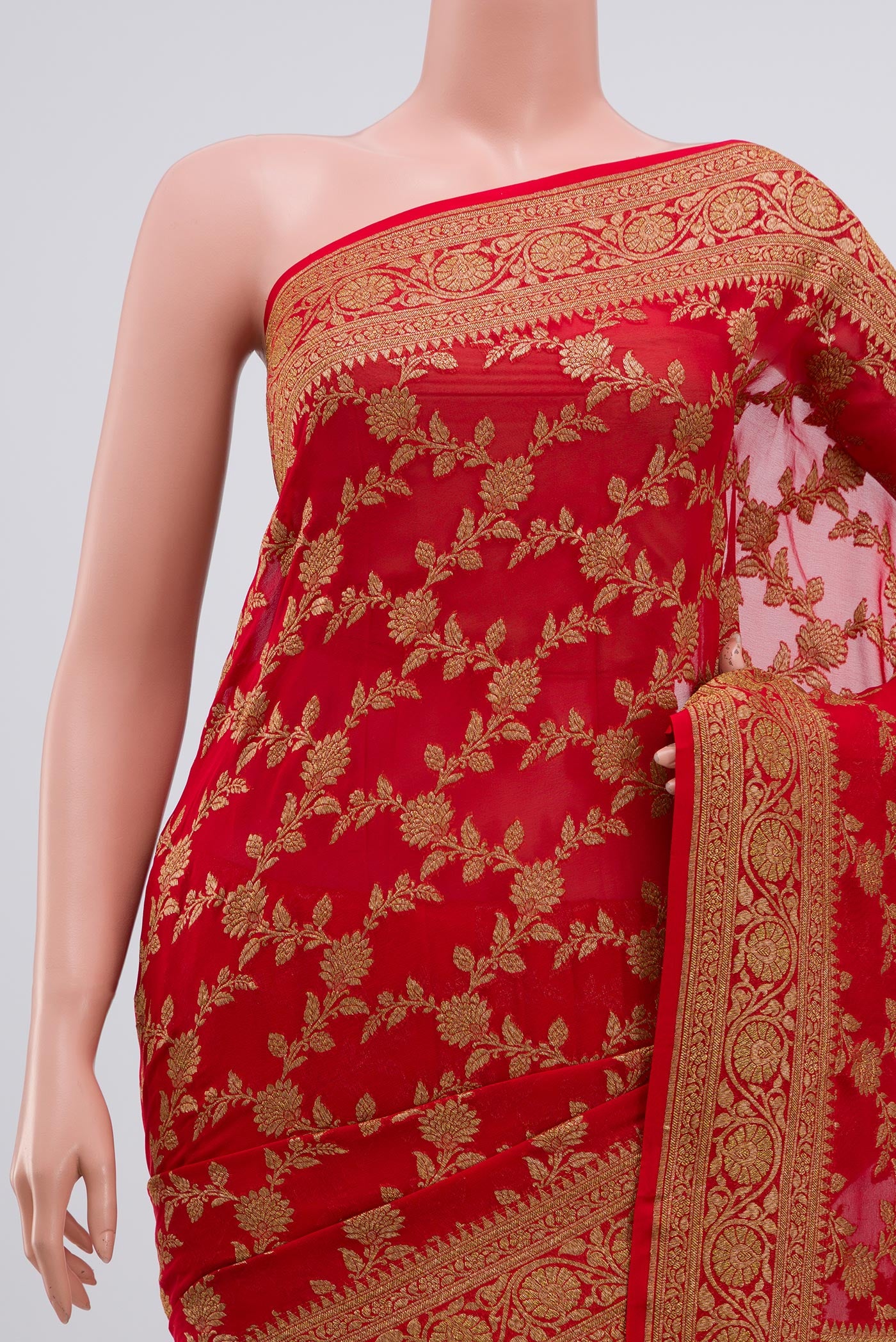 Border image of Red Georgette Saree with Fancy on the body and Zari Border. 