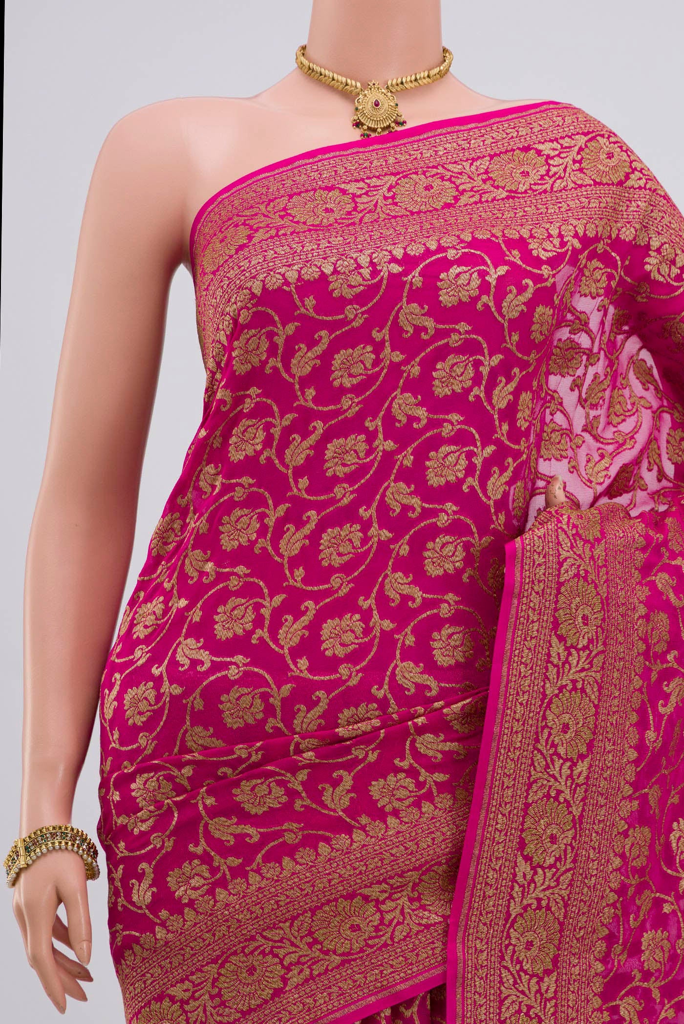 Border image of Pink Georgette Saree with Fancy on the body and Zari Border. 
