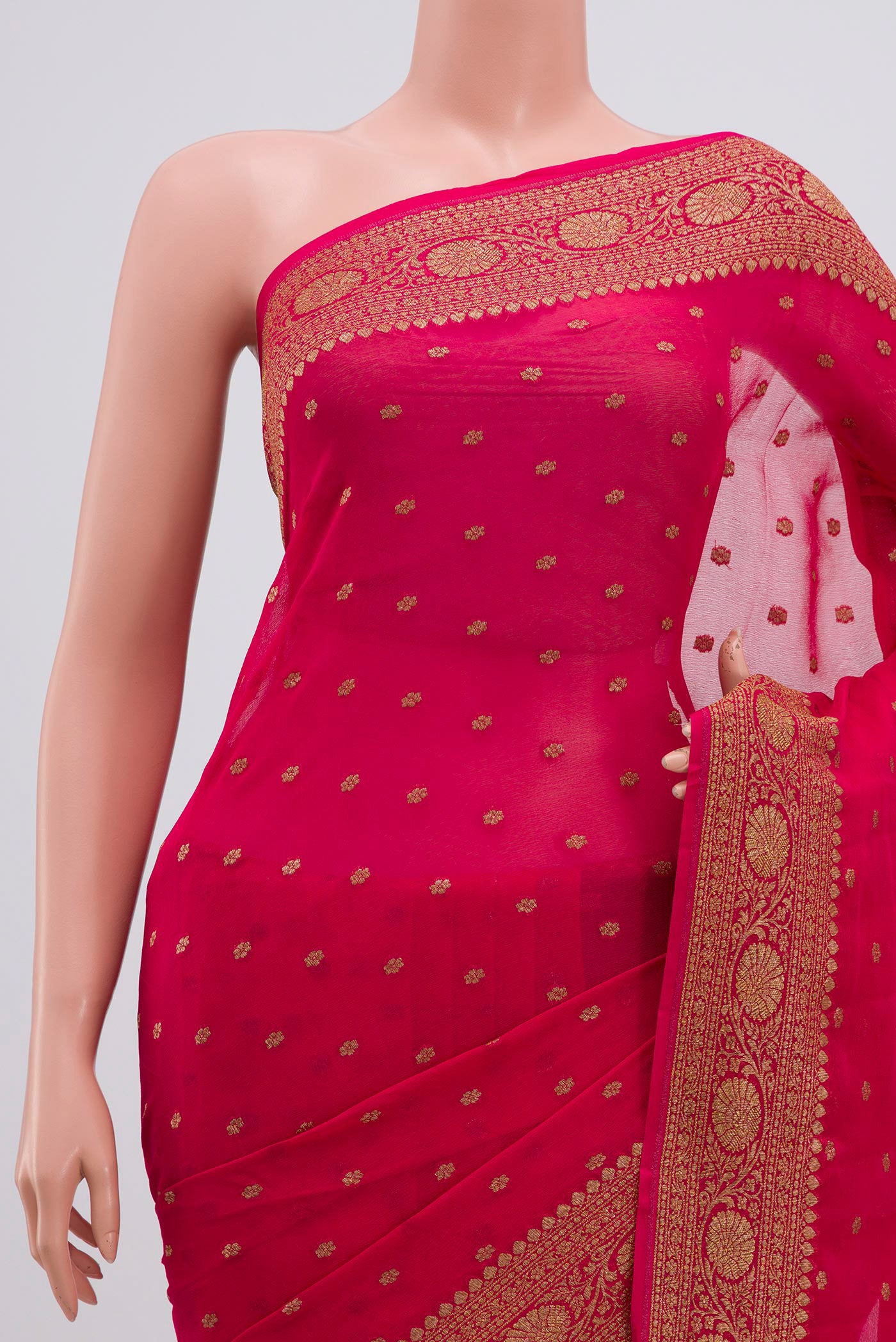 Border image of Pink Banarasi Georgette Saree with Zari Butta on the body and Zari Border. 