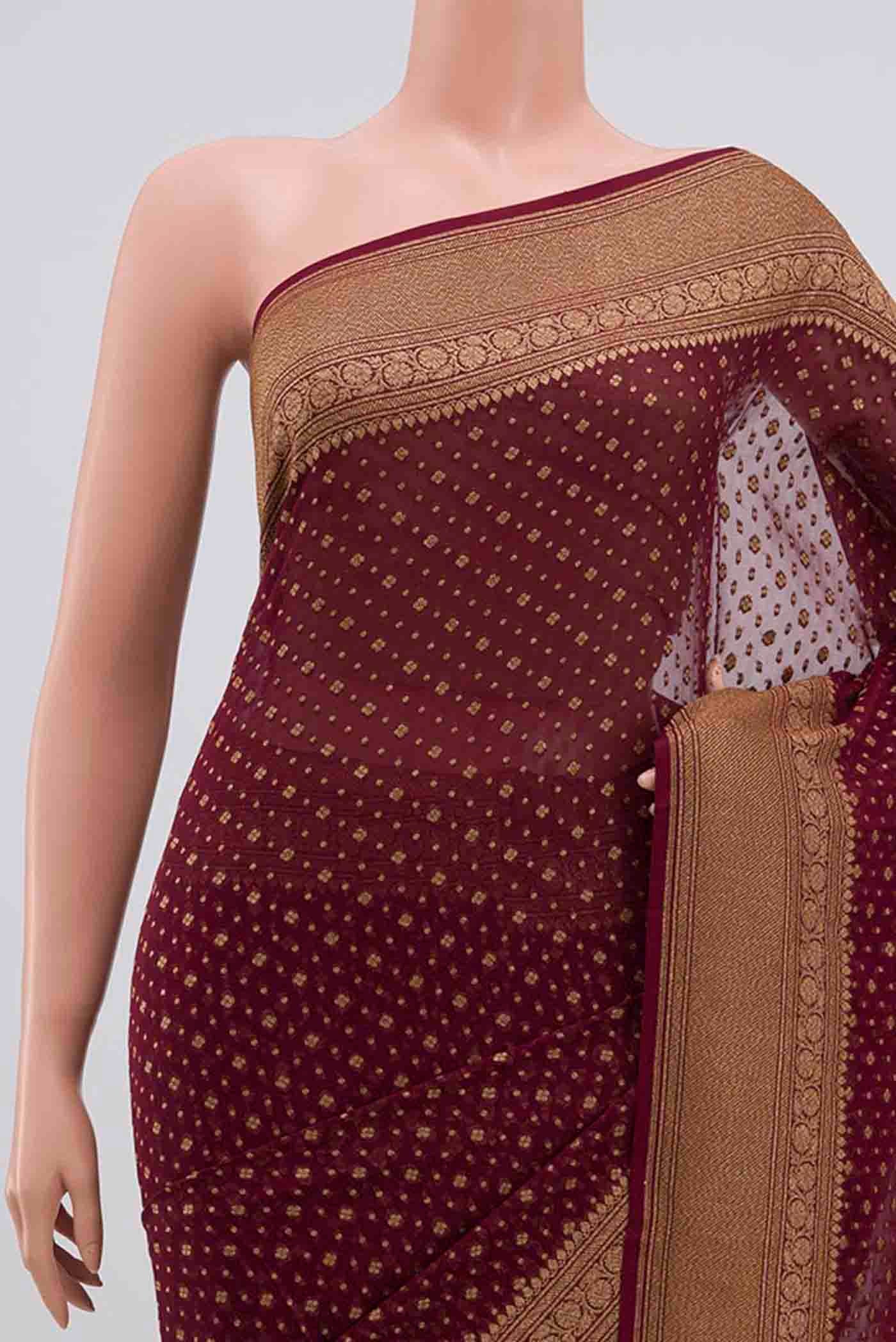 Border image of Maroon Banarasi Georgette Saree with Zari Brocade on the body and Zari Border. 