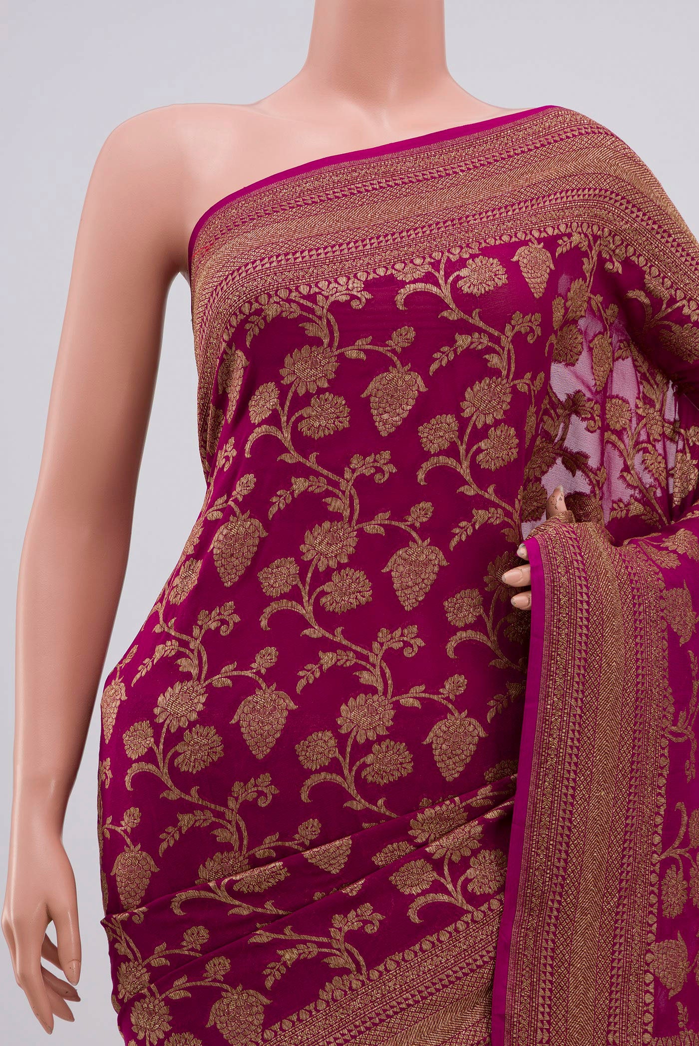 Border image of Magenta Georgette Saree with Fancy on the body and Zari Border. 