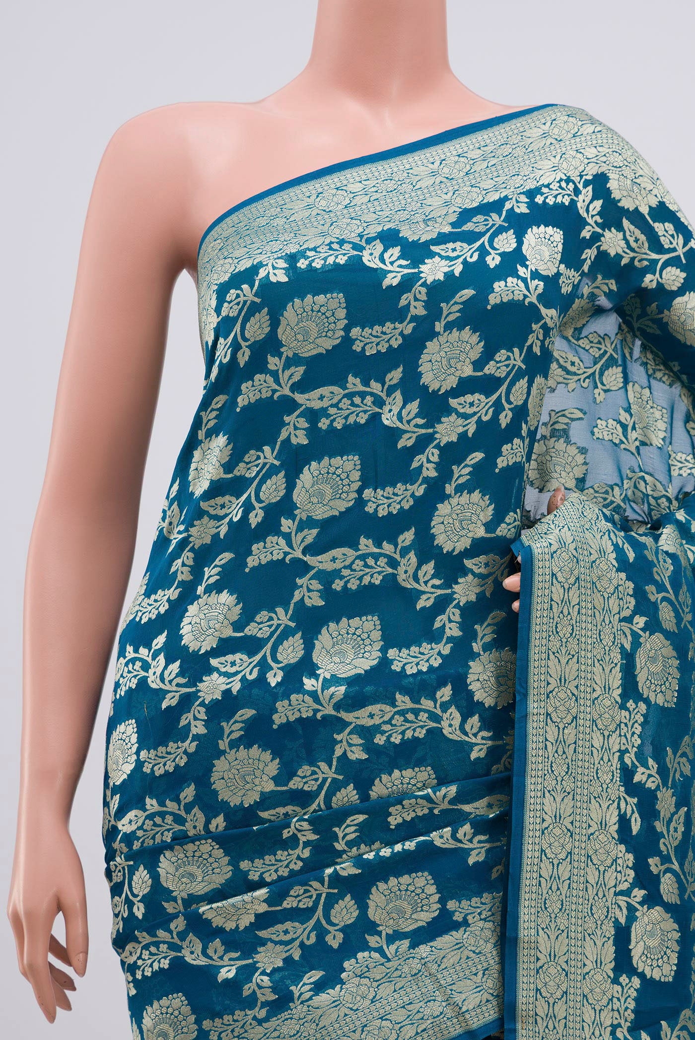 Border image of Blue Georgette Saree with Fancy on the body and Zari Border. 