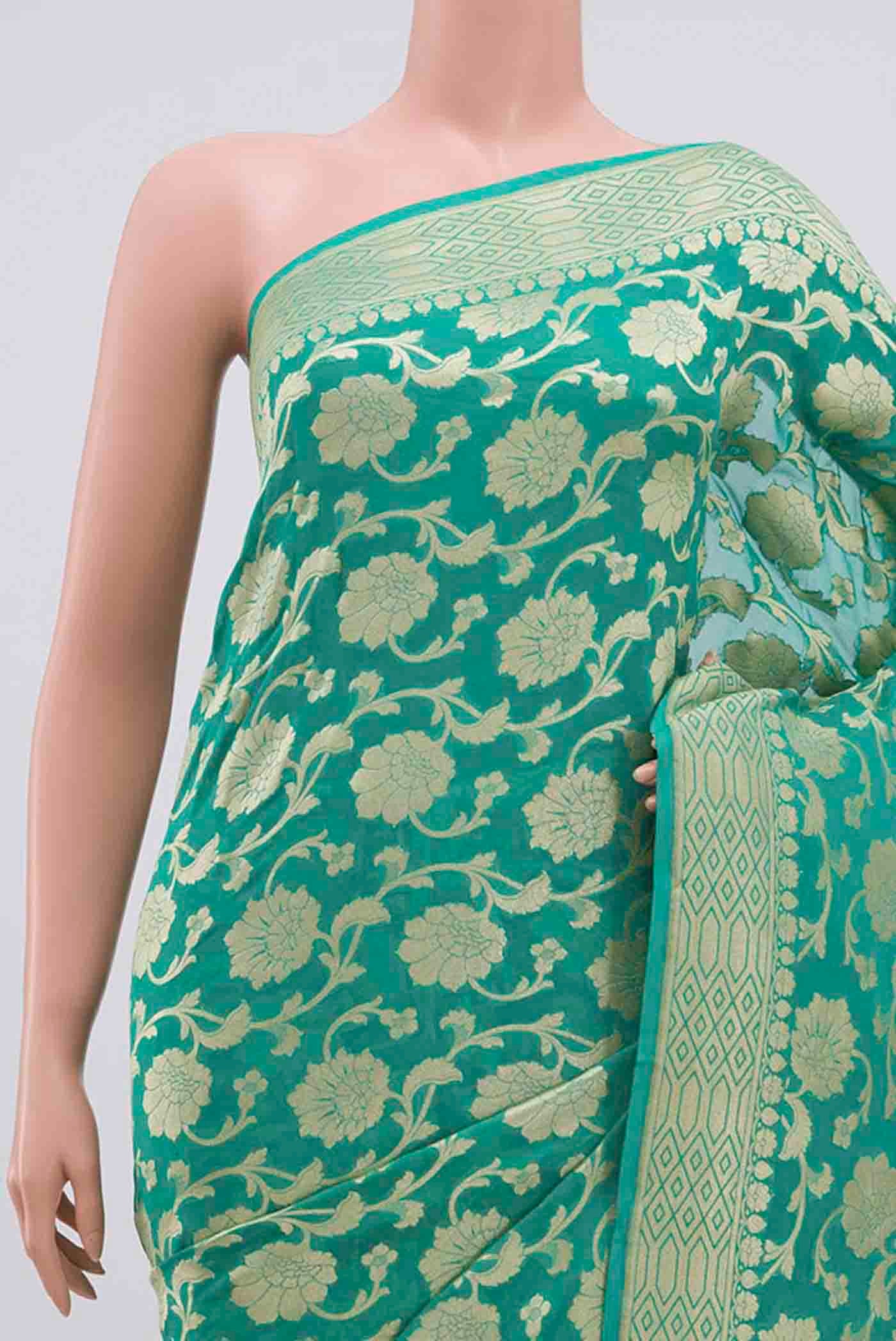 Border image of Mint Green Banarasi Georgette Saree with Zari Brocade on the body and Zari Border. 