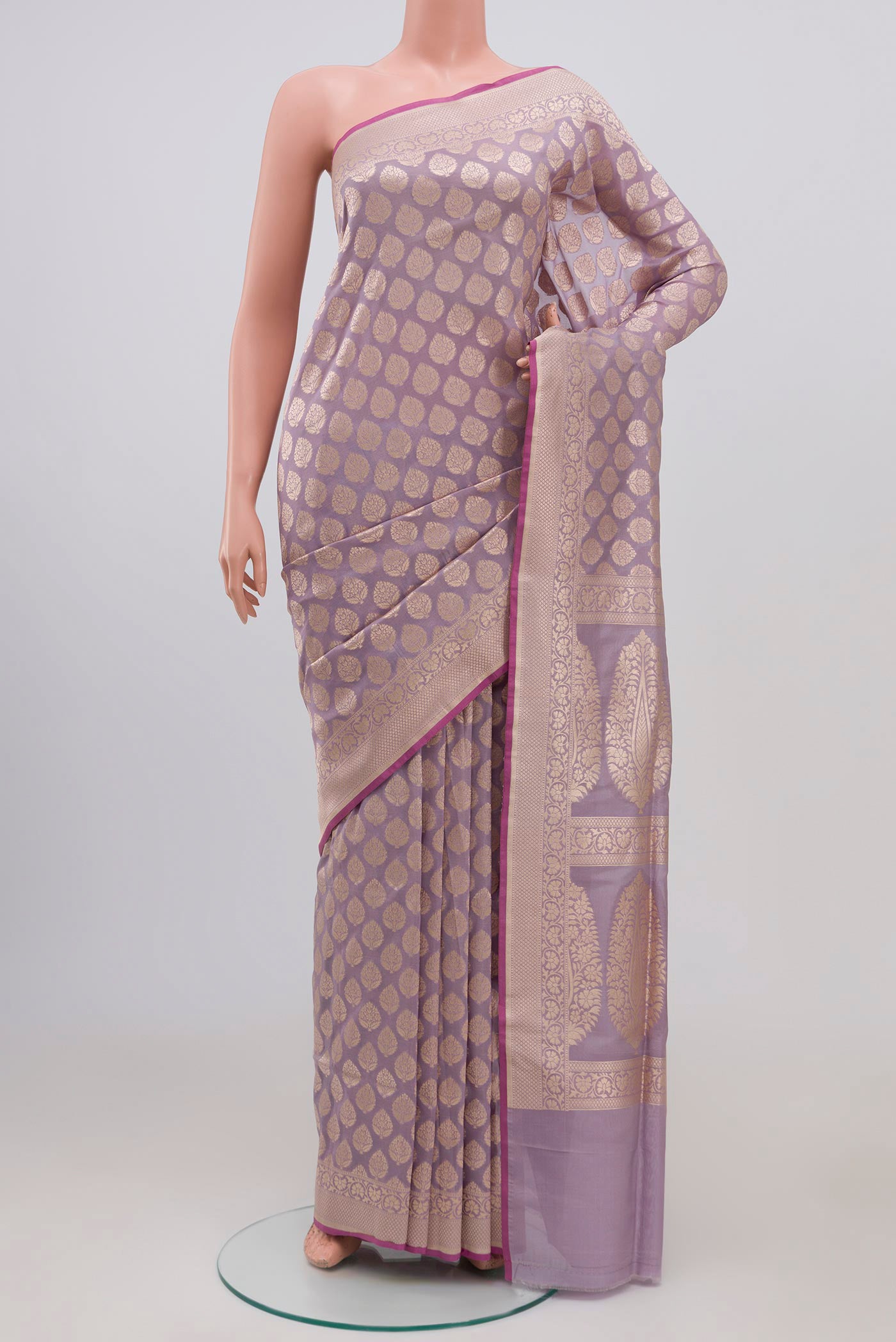 Lavender Banarasi Silk Saree with Zari Brocade on the body and Zari Border.  displayed on a mannequin