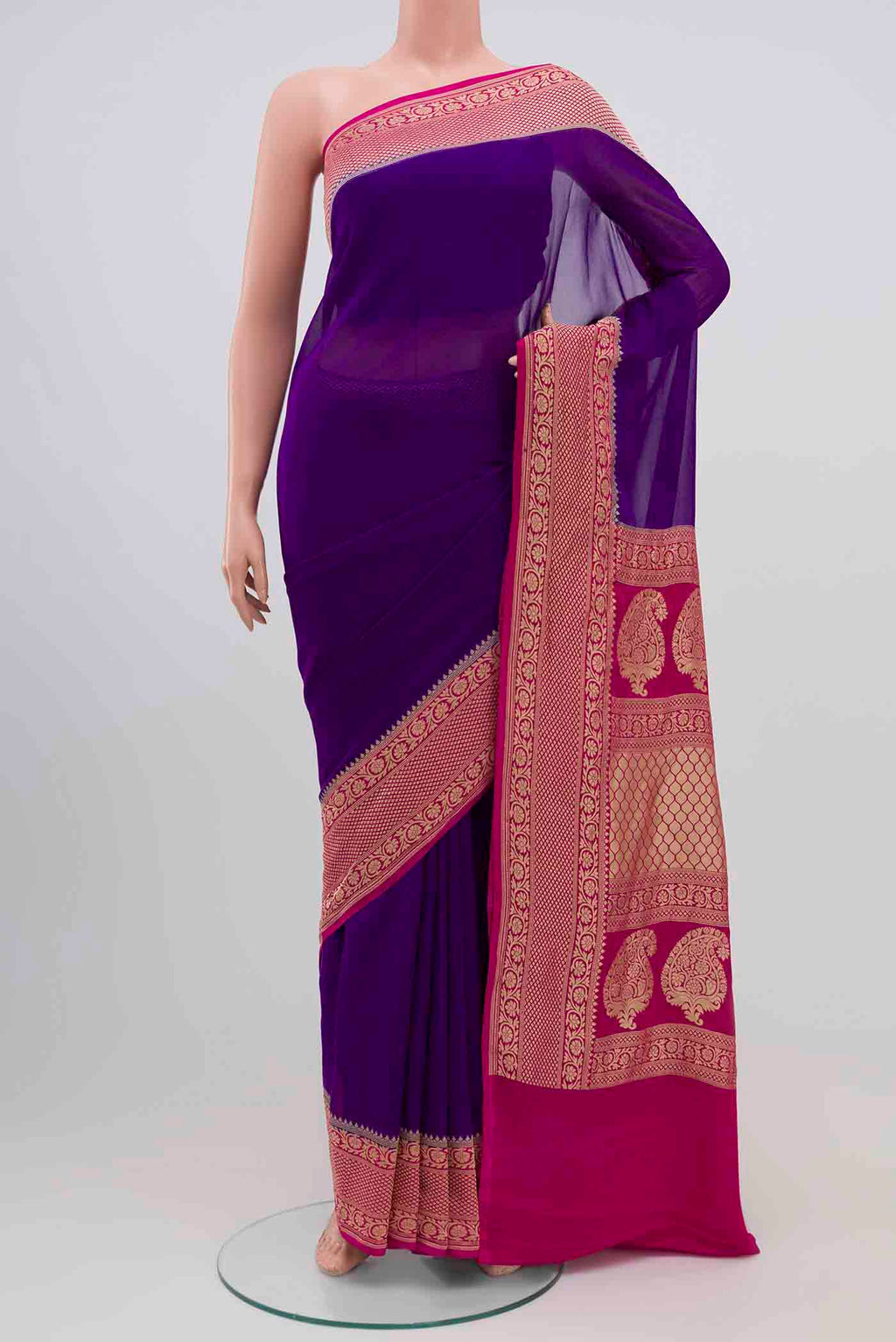 Purple Banarasi Georgette Saree with Plain Body and Zari Border.  displayed on a mannequin