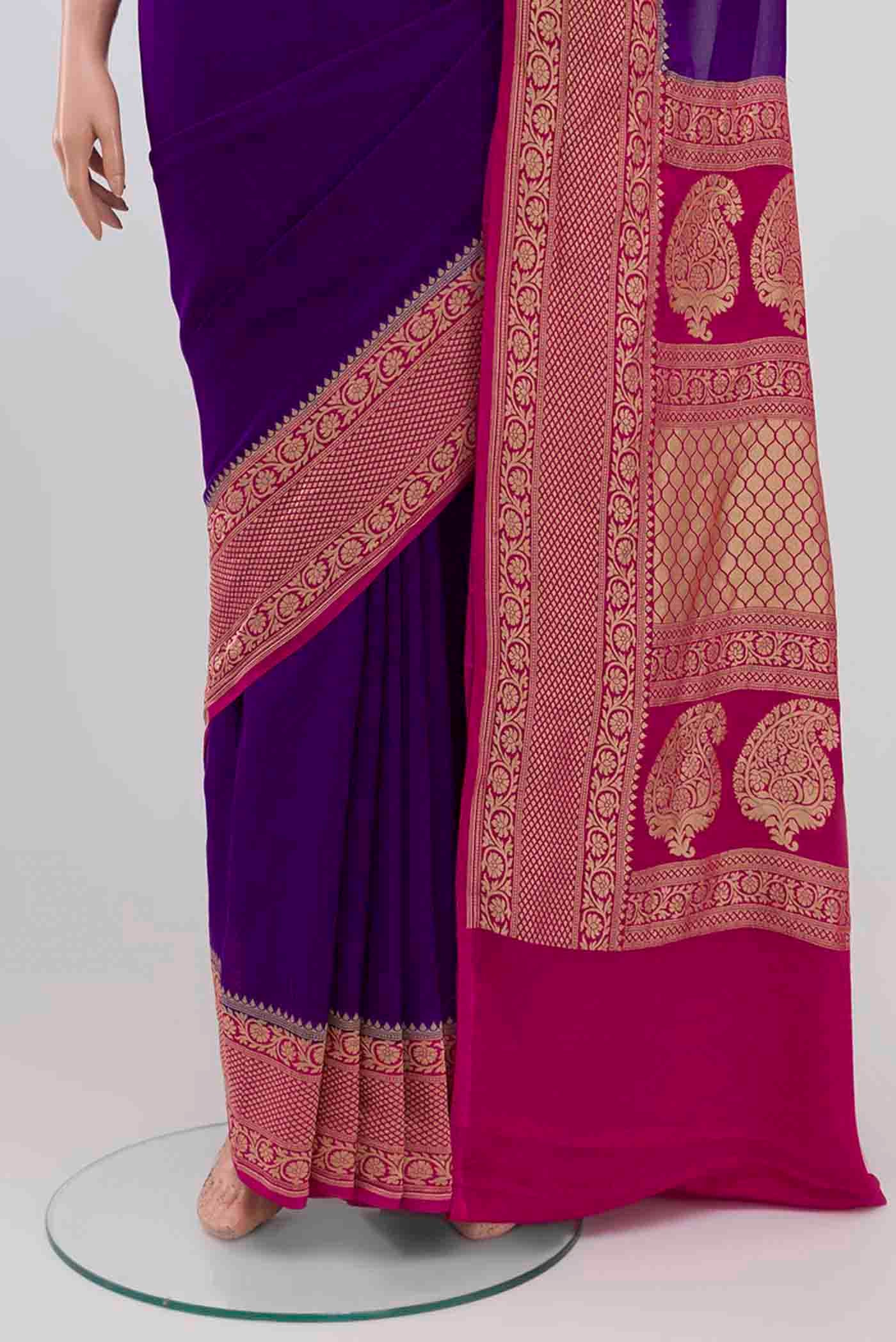Pleats and pallu of Purple Banarasi Georgette Saree with Plain Body and Zari Border. 