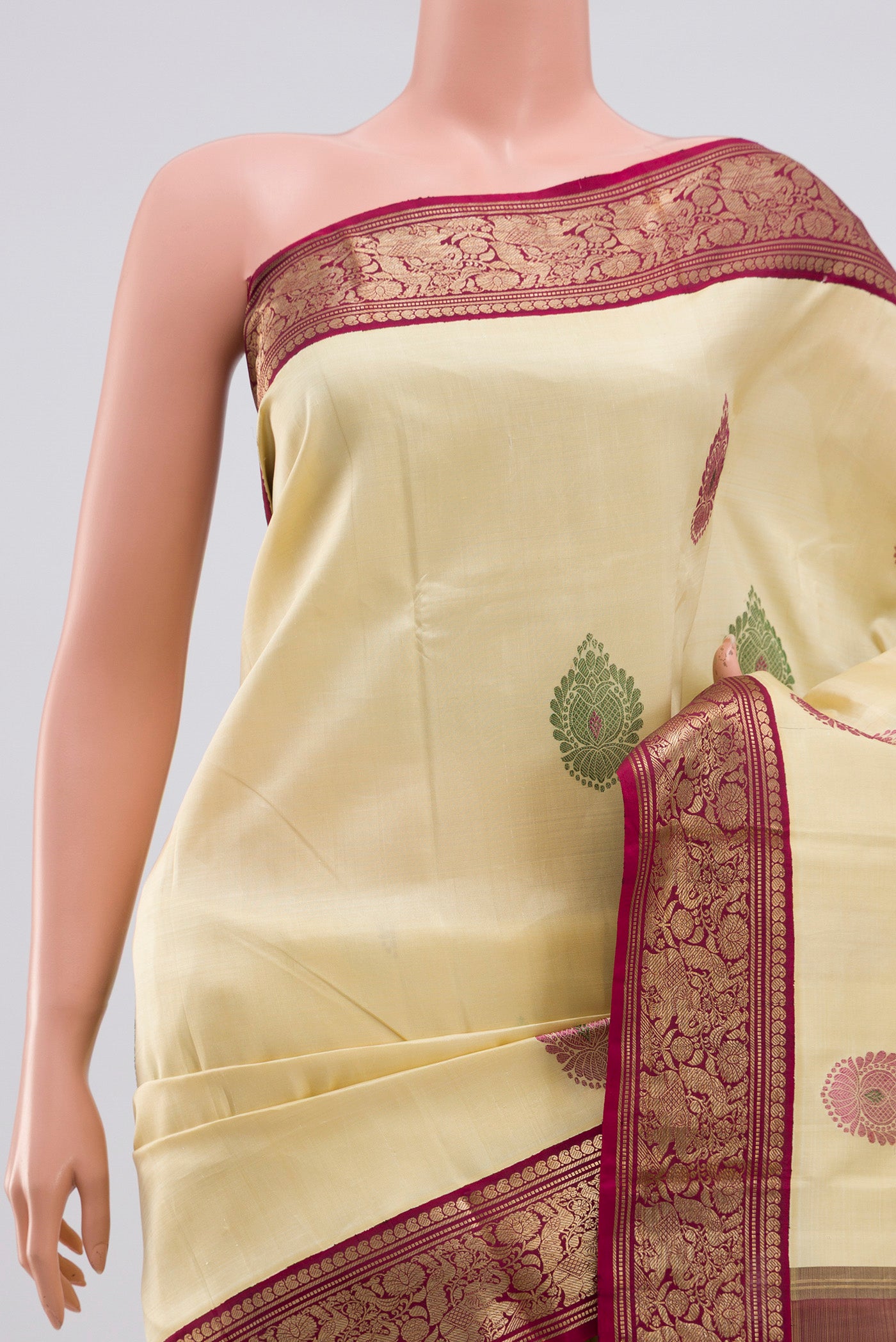 Border image of Pure Silk Pure Zari Cream Kanjivaram Saree with Zari Butta on the body and Zari Border. 