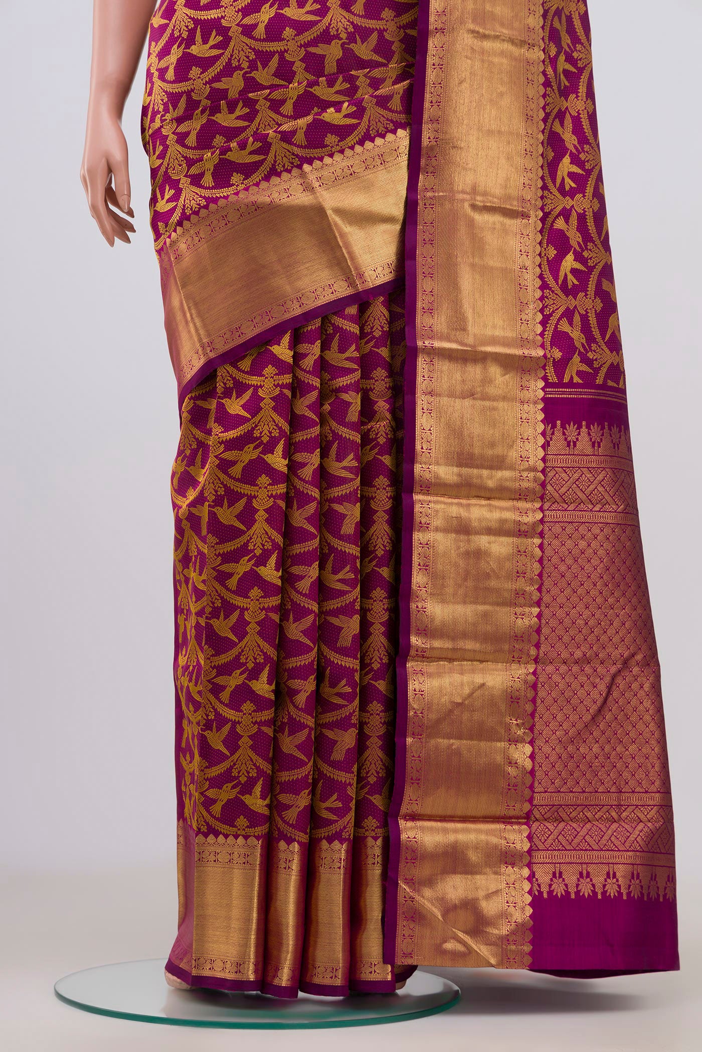 Pleats and pallu of Pure Silk Pure Zari Purple Kanjivaram Saree with Jacquard design on the body and Zari Border. 