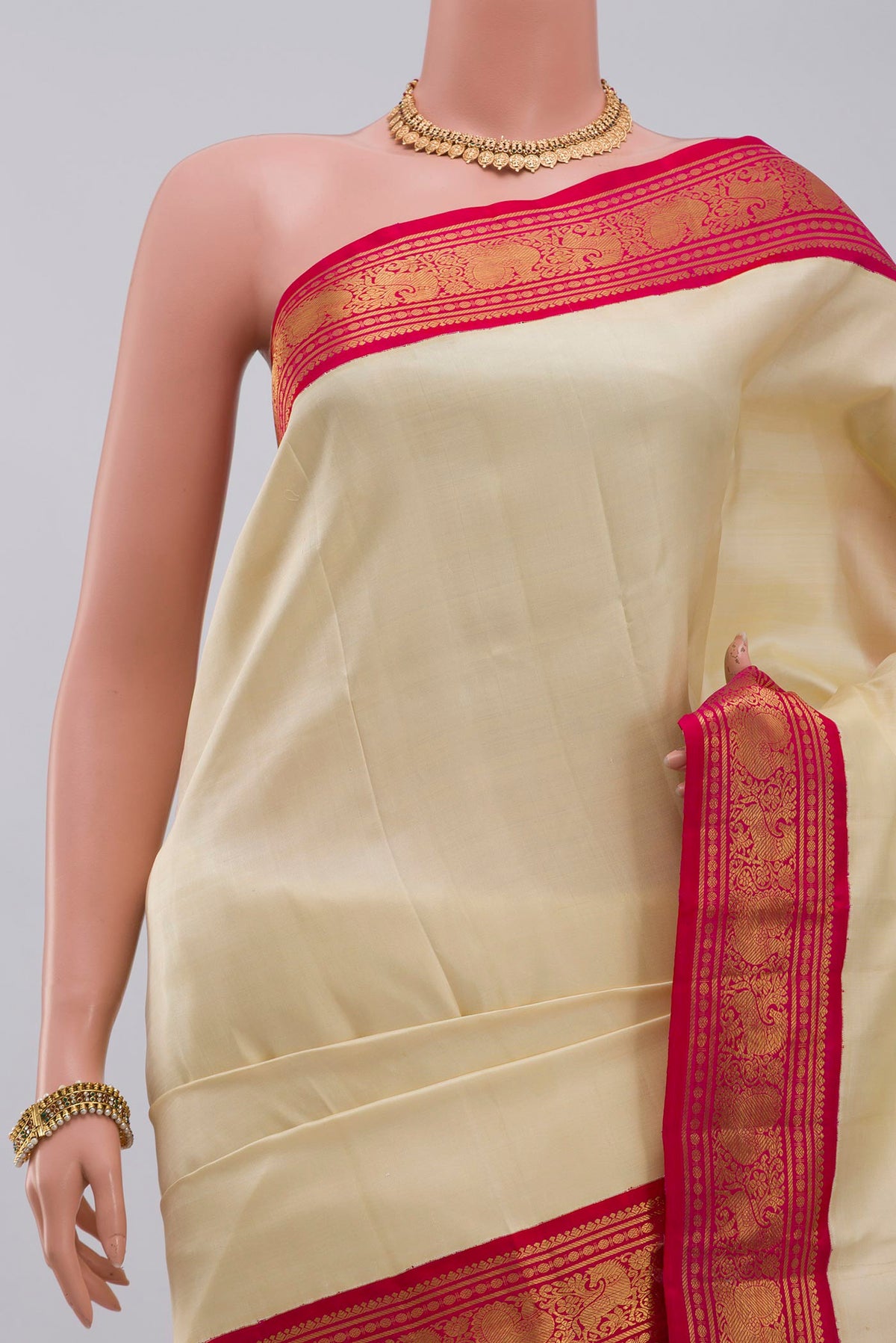 Border image of Pure Silk Pure Zari Cream Kanjivaram Saree with Plain Body and Zari Border. 