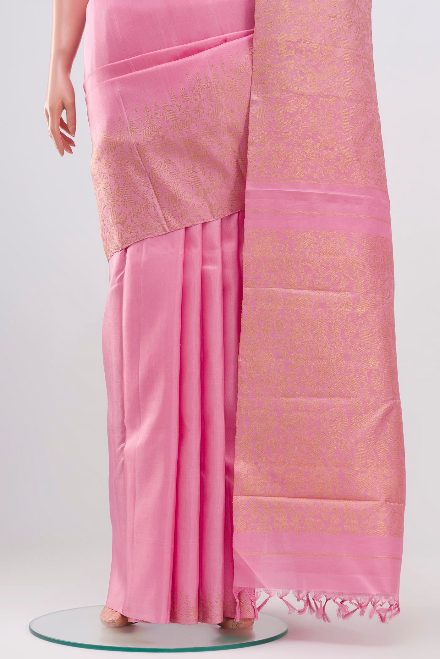 Pleats and pallu of Pure Silk Pure Zari Pink Kanjivaram Saree with Zari Brocade on the body and Without Border. 