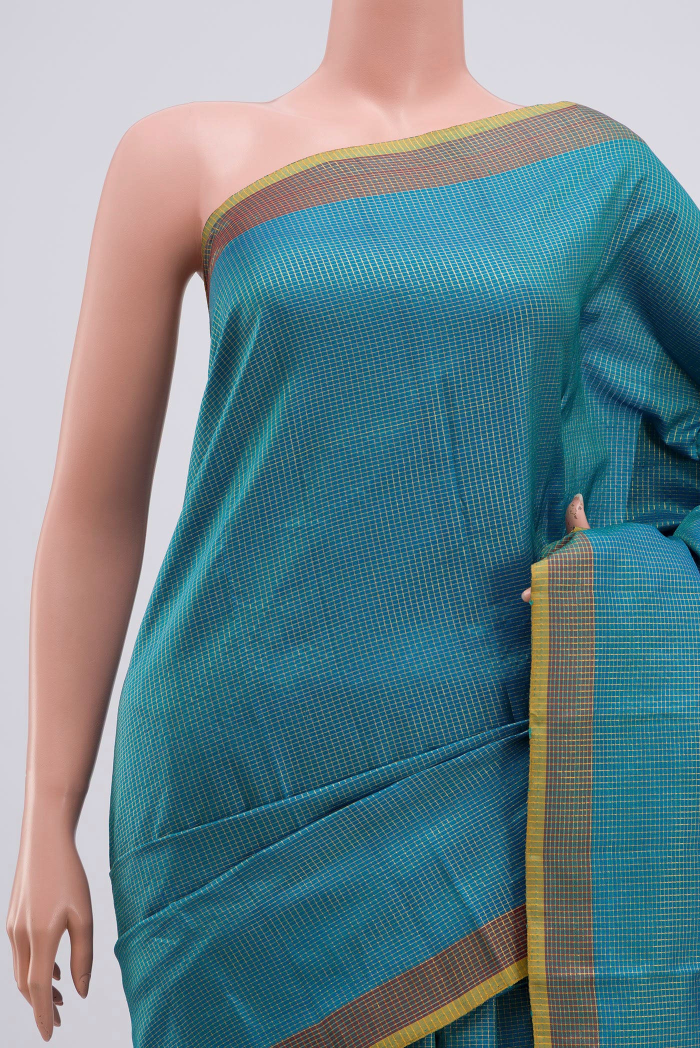Border image of Blue Kanchipuram Silk Saree with Checked design on the body and Zari Border. 
