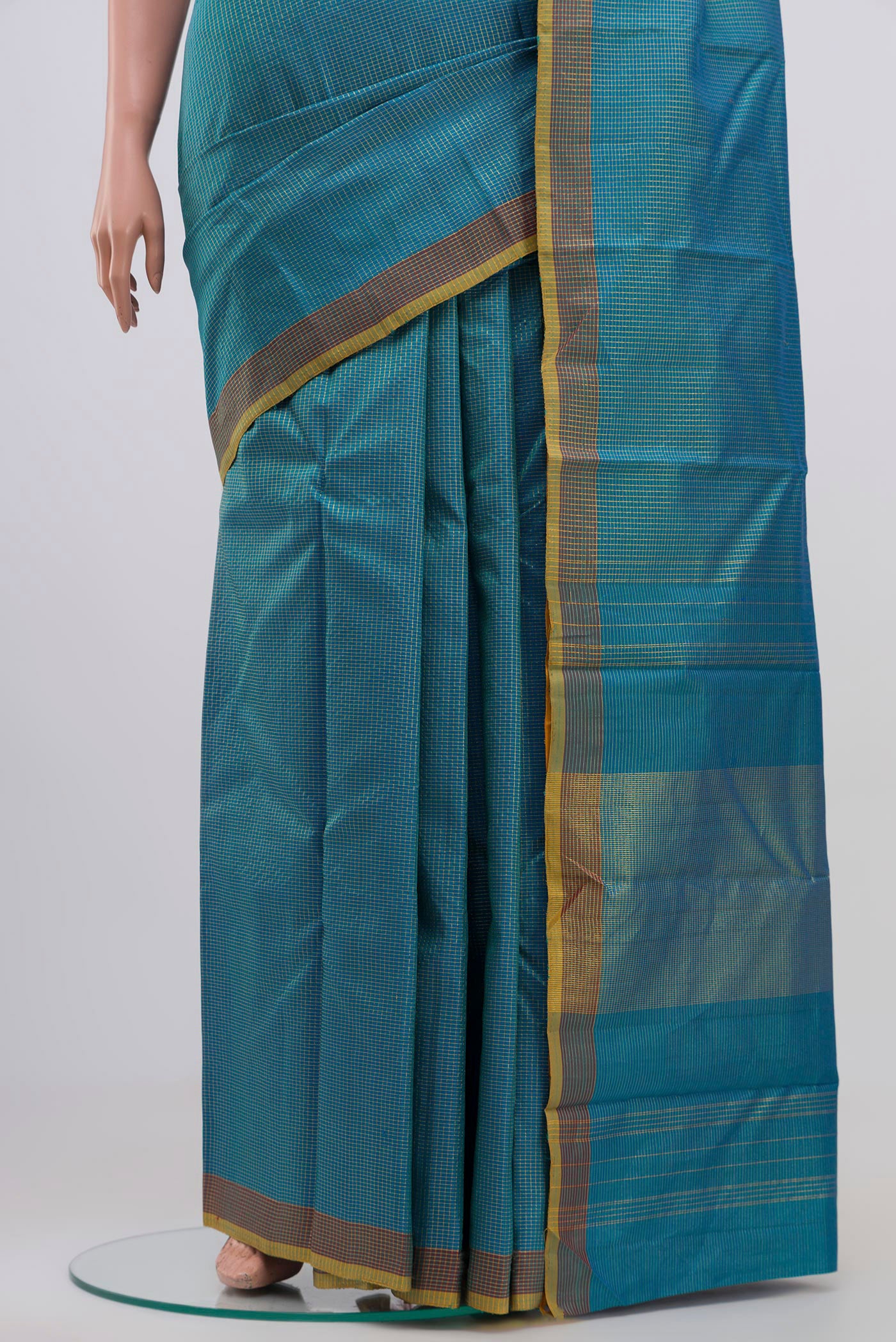 Pleats and pallu of Blue Kanchipuram Silk Saree with Checked design on the body and Zari Border. 