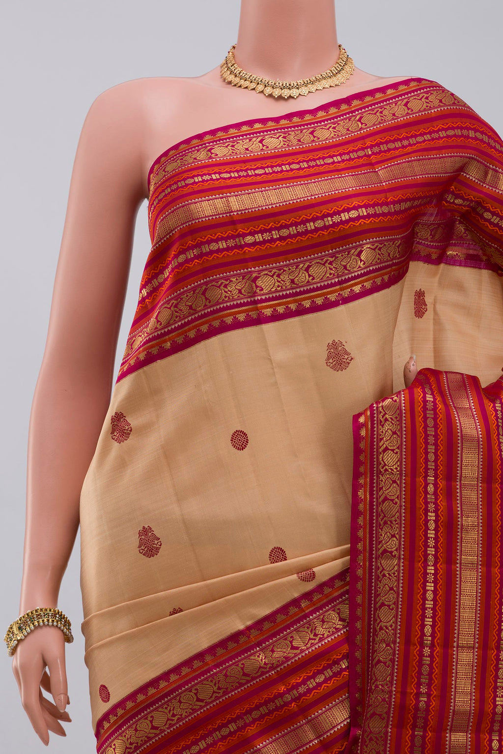 Border image of Pure Silk Pure Zari Cream Kanjivaram Saree with Thread Butta on the body and Zari Border. 