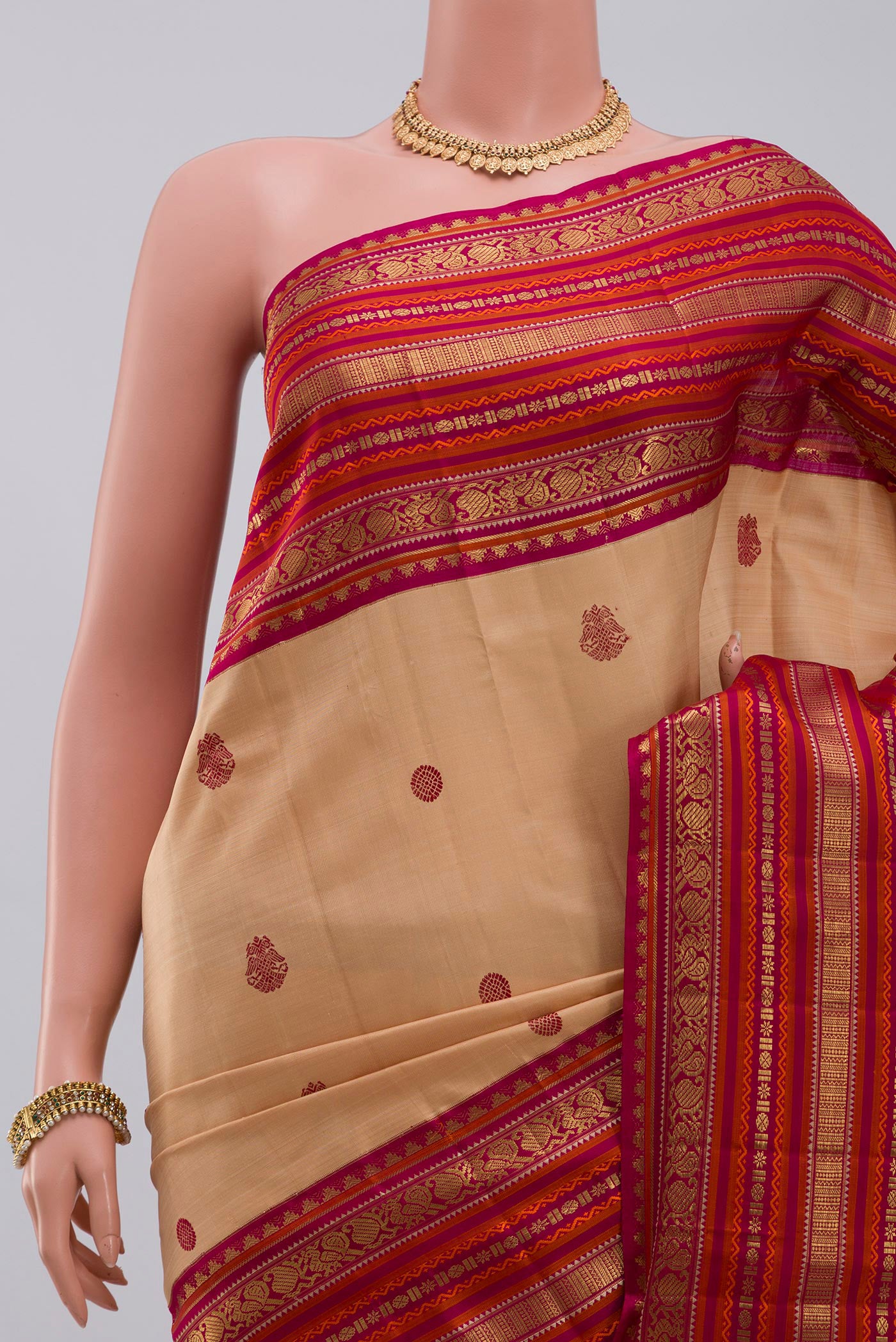 Border image of Pure Silk Pure Zari Cream Kanjivaram Saree with Thread Butta on the body and Zari Border. 