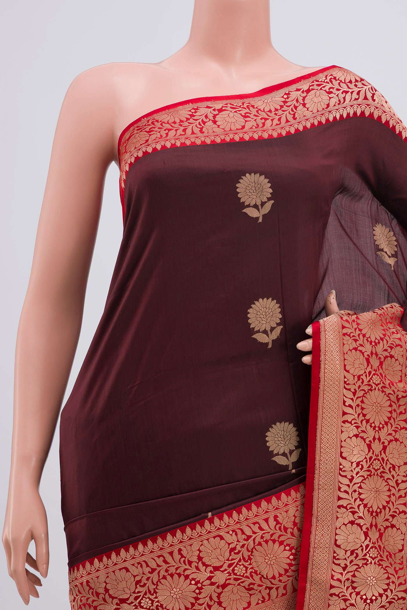 Border image of Maroon Banarasi Katan Silk Saree with Zari Butta on the body and Zari Border. 