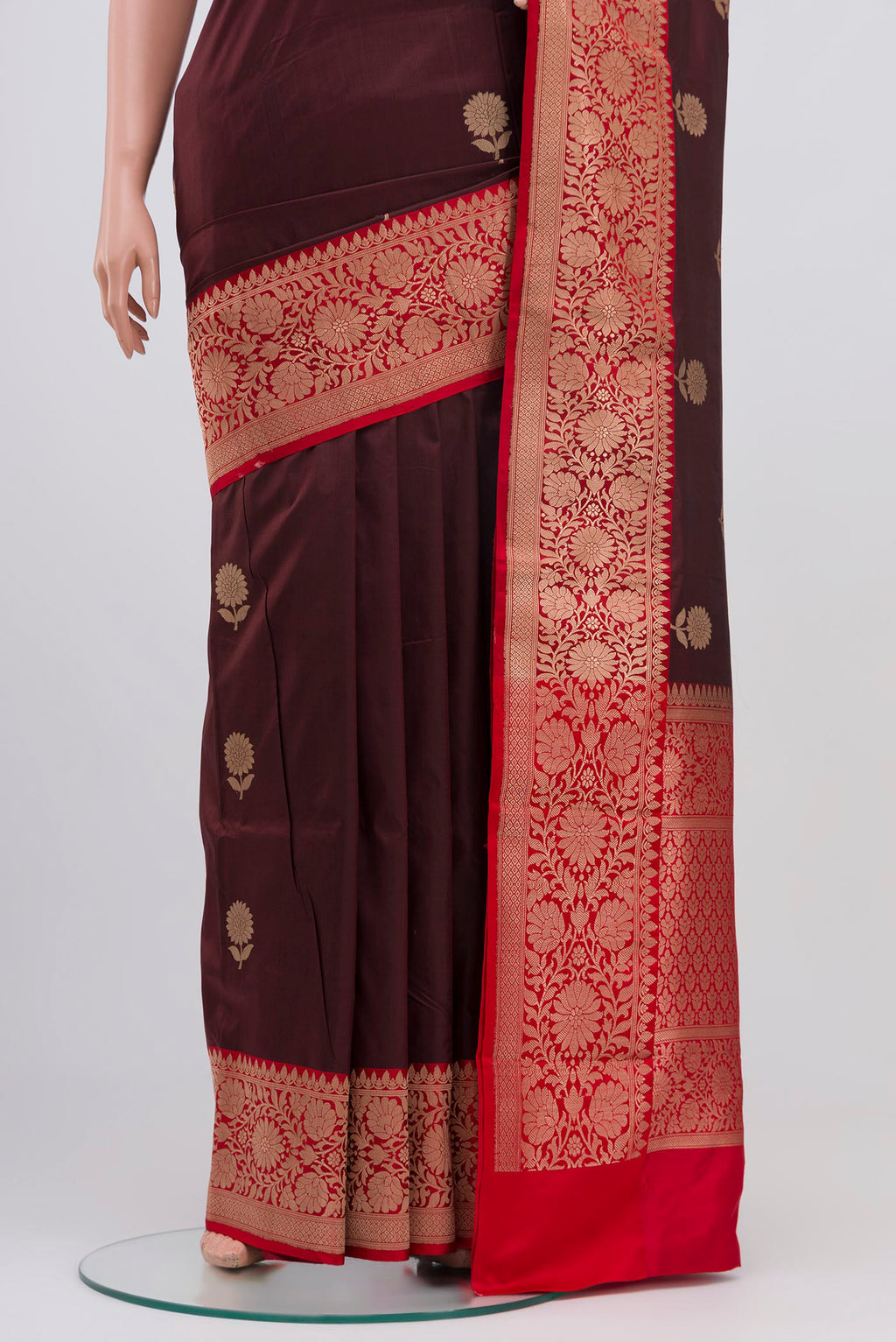 Pleats and pallu of Maroon Banarasi Katan Silk Saree with Zari Butta on the body and Zari Border. 