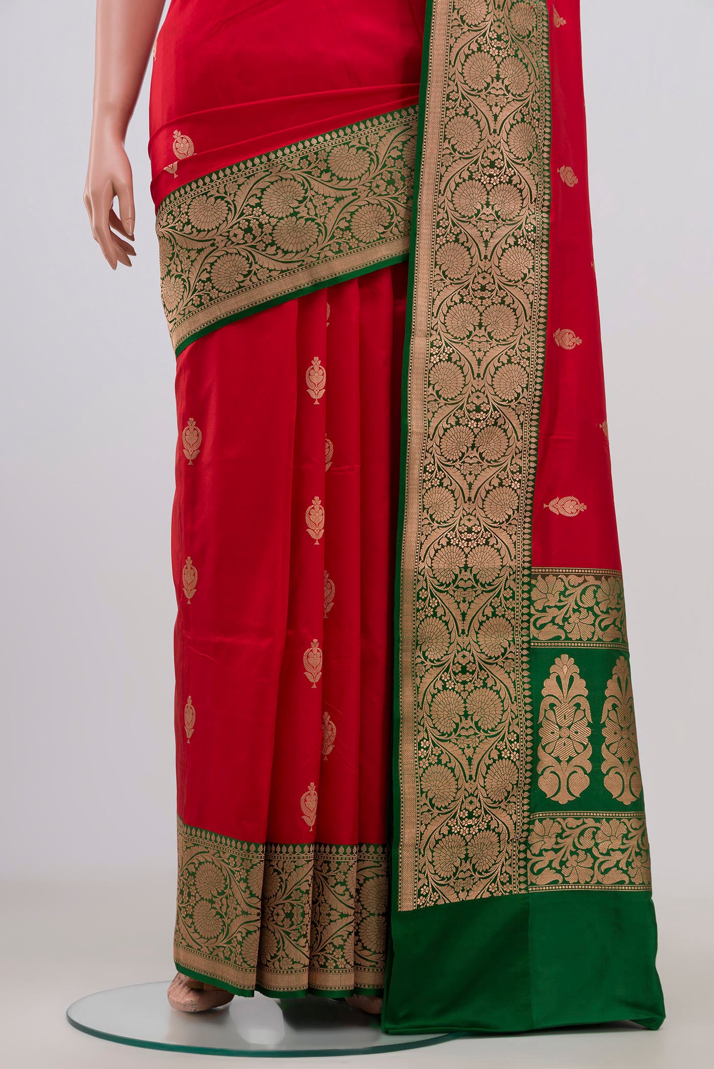Pleats and pallu of Red Banarasi Katan Silk Saree with Zari Butta on the body and Zari Border. 
