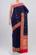 Blue Banarasi Katan Silk Saree with Zari Butta on the body and Zari Border.  displayed on a mannequin