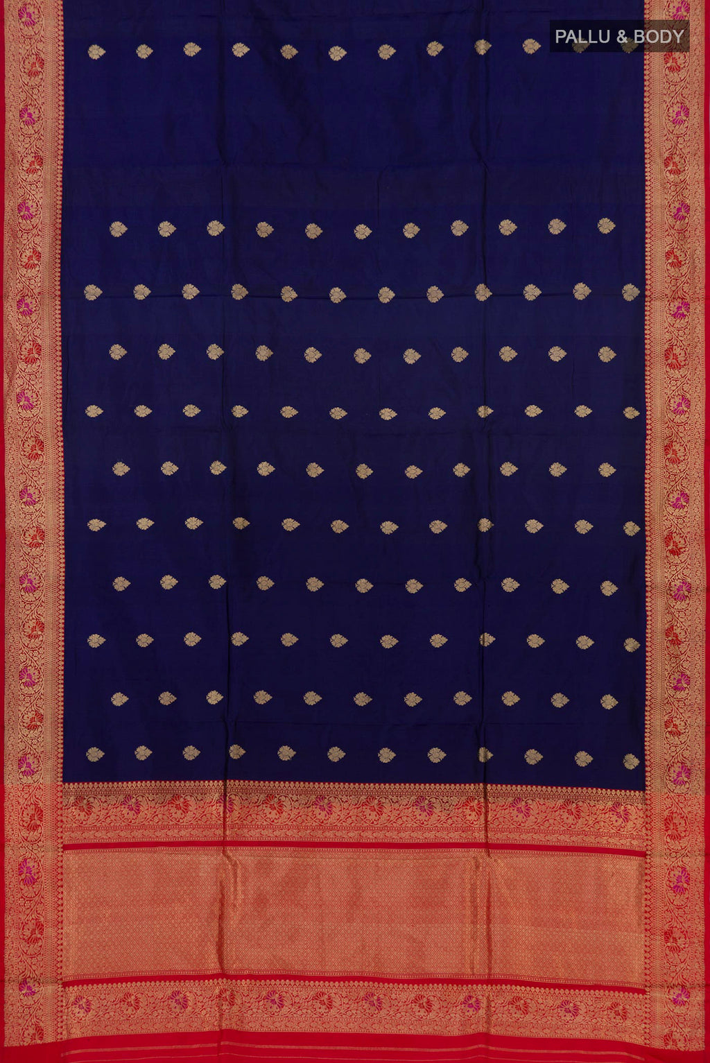 Flat view of Blue Banarasi Katan Silk Saree with Zari Butta on the body and Zari Border. 
