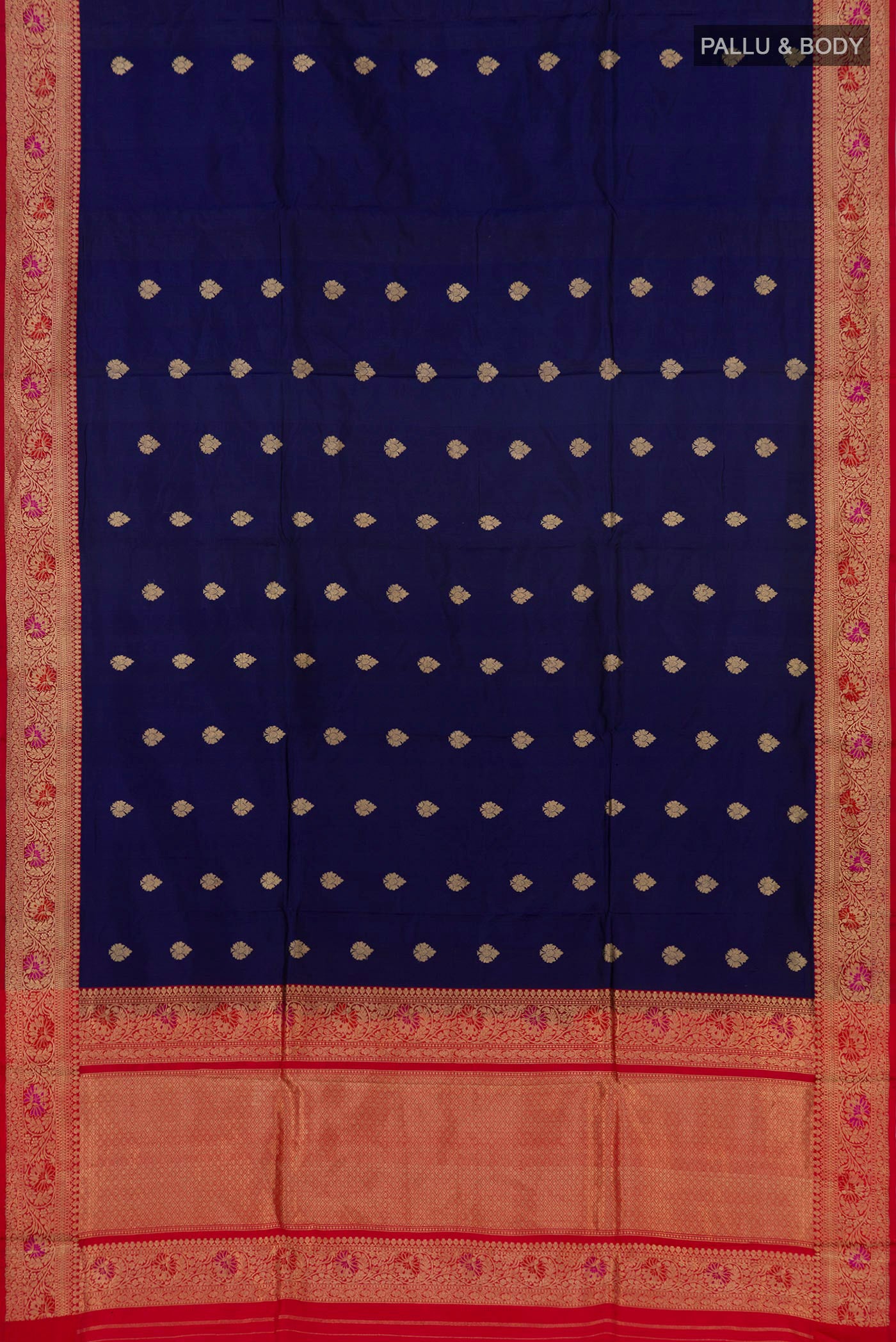 Flat view of Blue Banarasi Katan Silk Saree with Zari Butta on the body and Zari Border. 