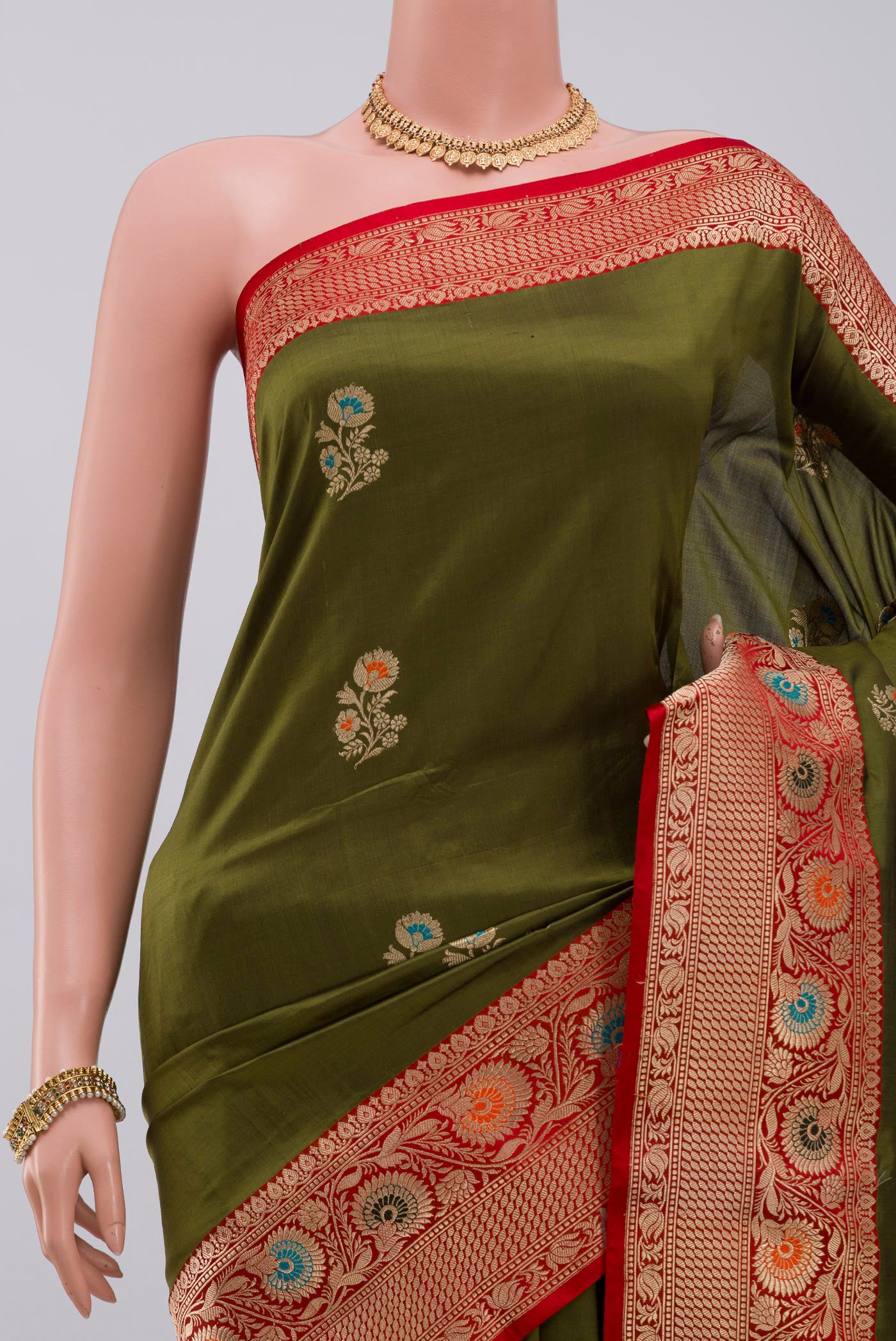 Border image of Mehandi Green Banarasi Katan Silk Saree with Zari Butta on the body and Zari Border. 