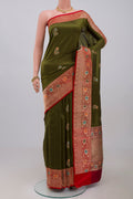 Mehandi Green Banarasi Katan Silk Saree with Zari Butta on the body and Zari Border.  displayed on a mannequin