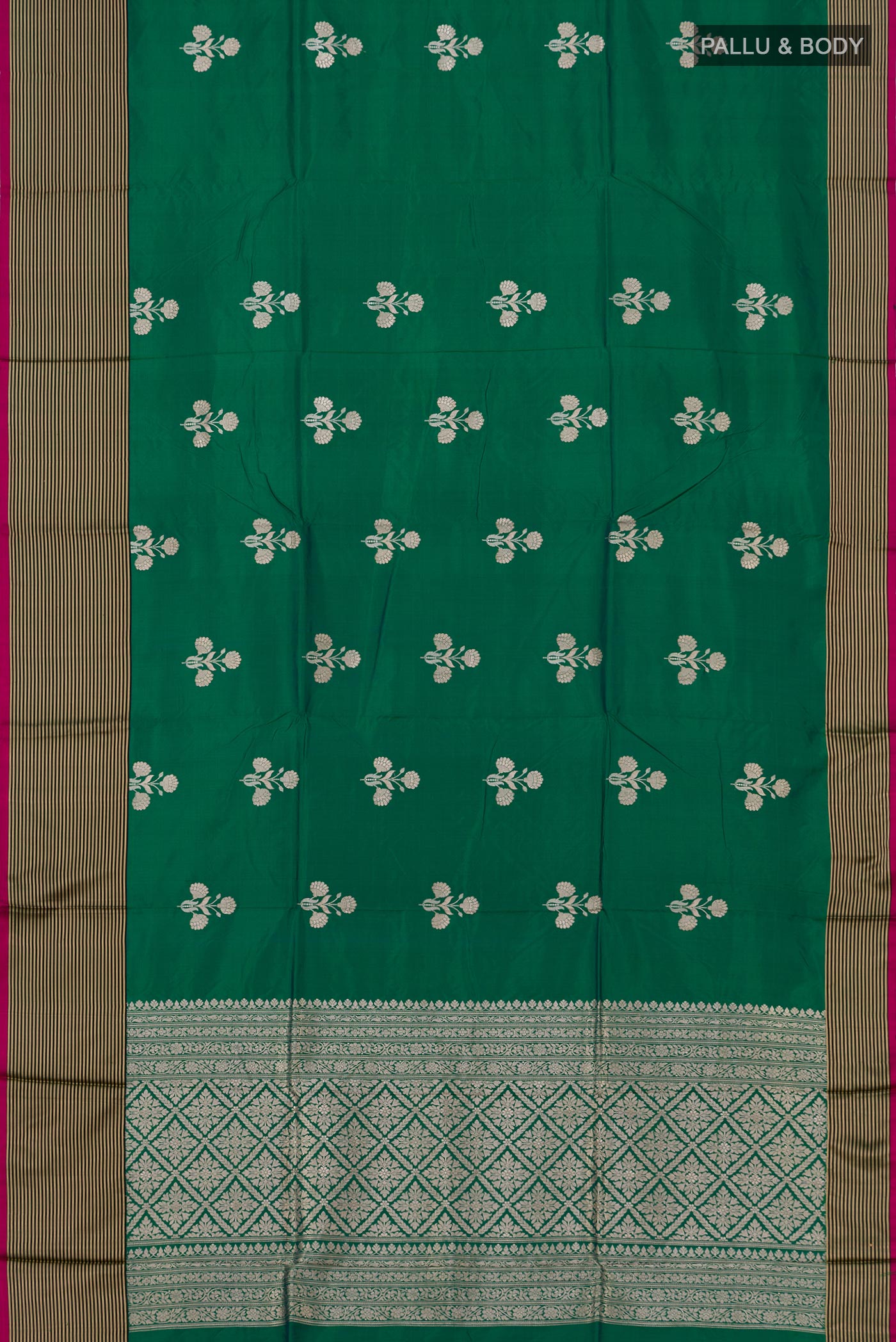 Flat view of Green Banarasi Katan Silk Saree with Zari Butta on the body and Thin Zari Line. 