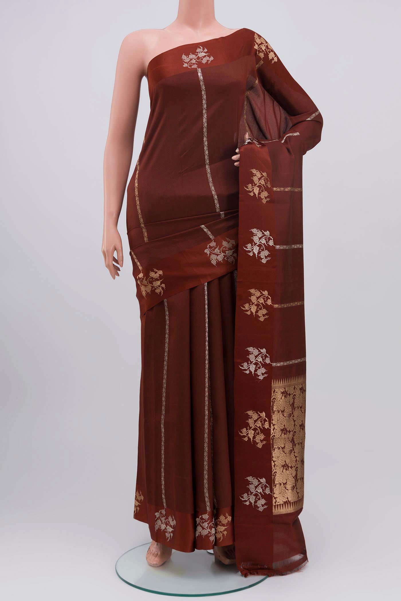 Brown Banarasi Katan Silk Saree with Fancy on the body and Fancy Border.  displayed on a mannequin