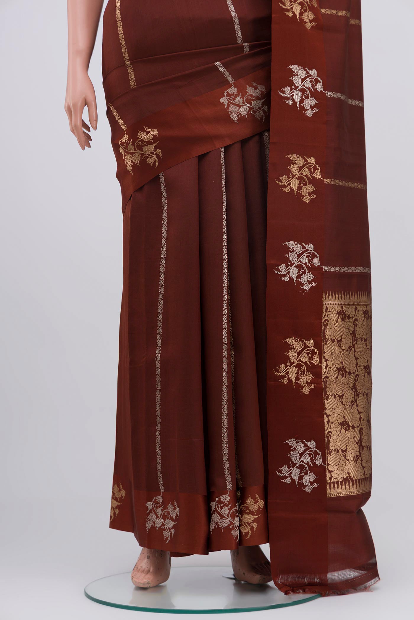 Pleats and pallu of Brown Banarasi Katan Silk Saree with Fancy on the body and Fancy Border. 