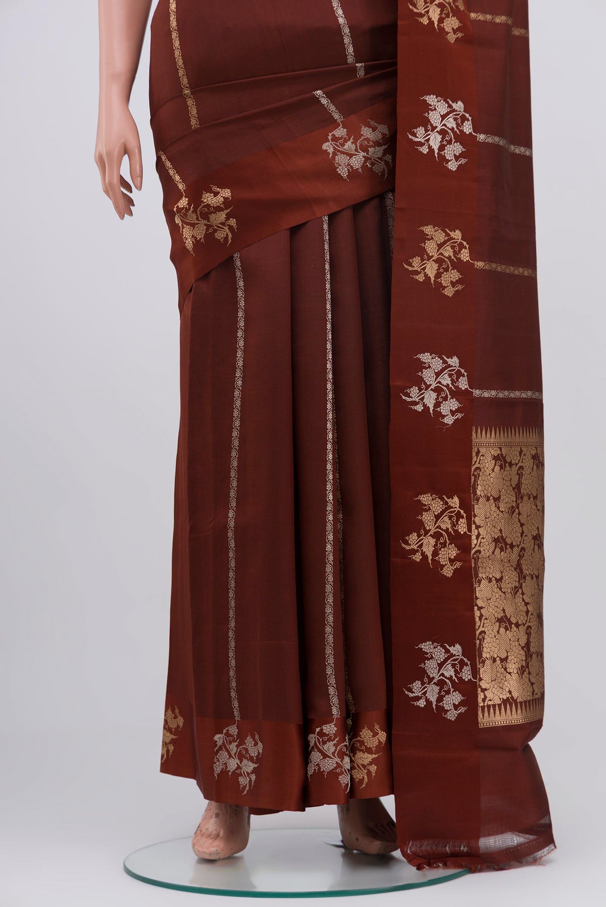 Pleats and pallu of Brown Banarasi Katan Silk Saree with Fancy on the body and Fancy Border. 