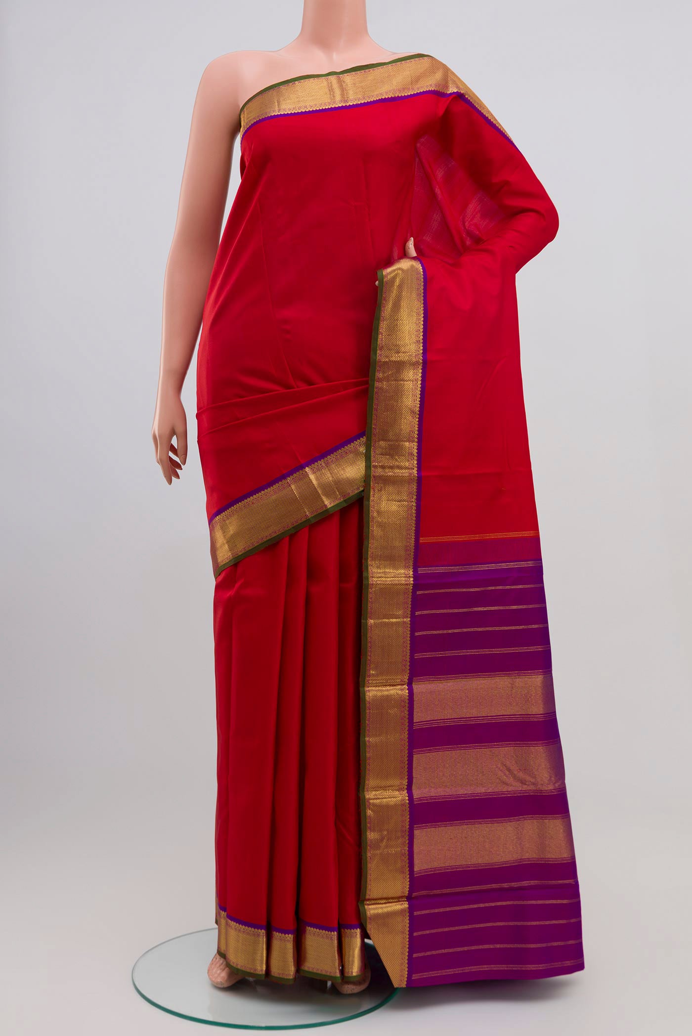 Pure Silk Pure Zari Red Kanchipuram Saree with Plain Body and Zari Border.  displayed on a mannequin