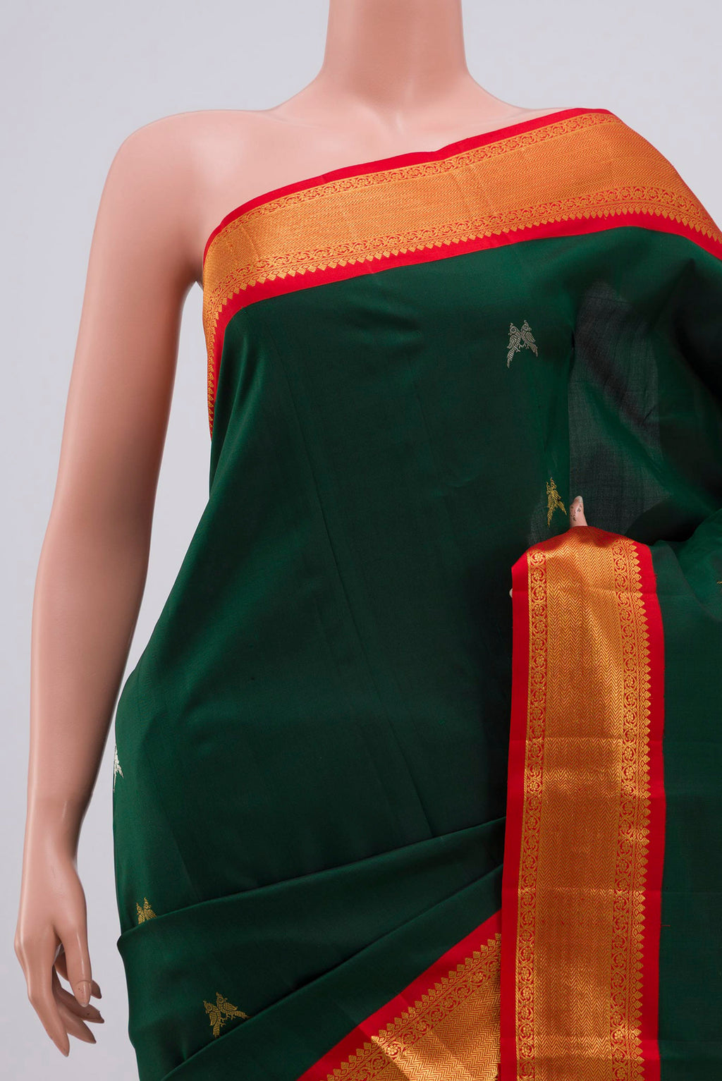 Border image of Pure Silk Pure Zari Bottle Green Kanjivaram Saree with Zari Butta on the body and Zari Border. 
