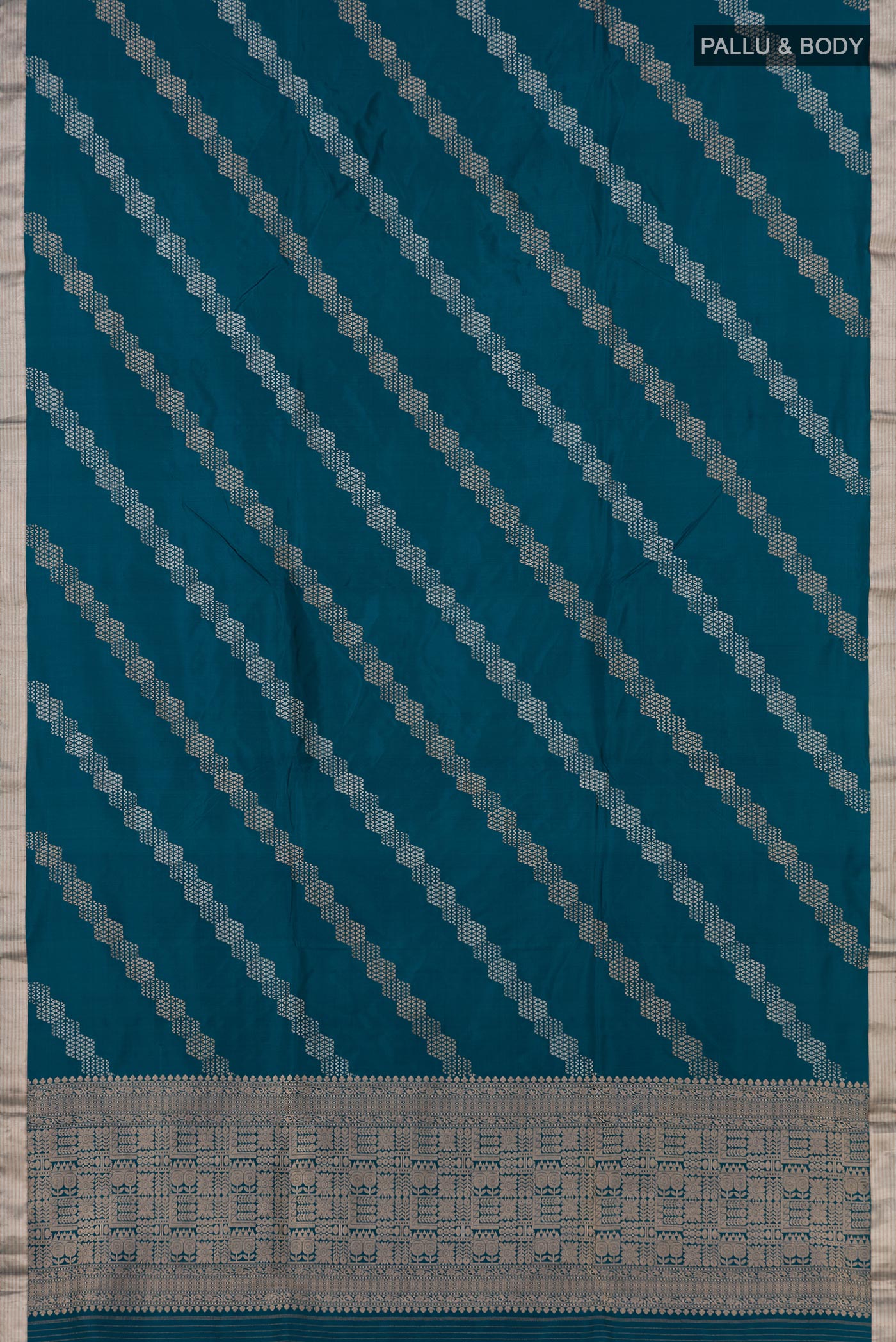 Flat view of Blue Banarasi Katan Silk Saree with Fancy on the body and Thin Zari Line. 