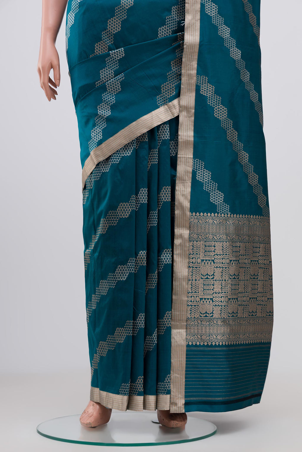 Pleats and pallu of Blue Banarasi Katan Silk Saree with Fancy on the body and Thin Zari Line. 