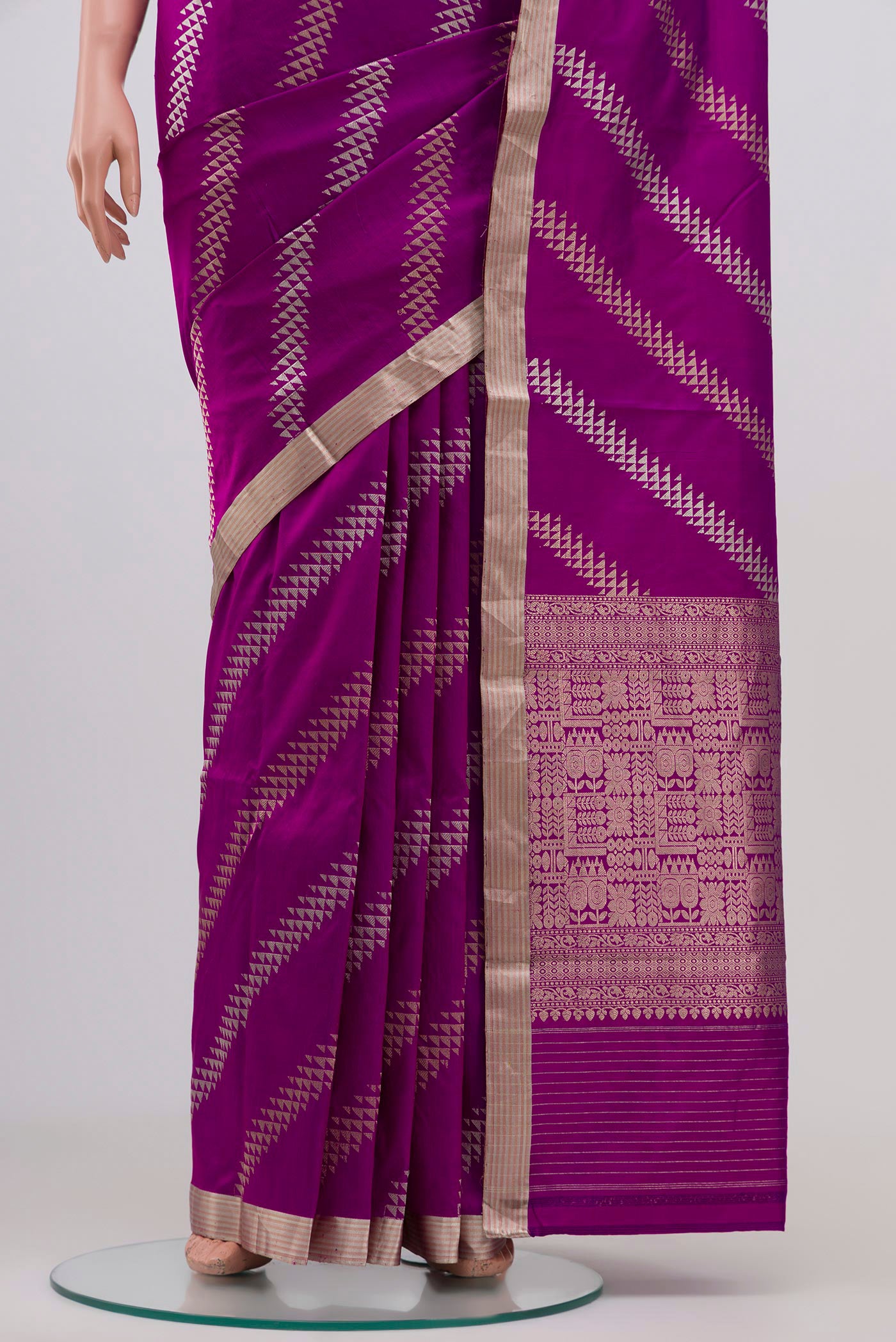 Pleats and pallu of Rani Pink Banarasi Katan Silk Saree with Fancy on the body and Thin Zari Line. 