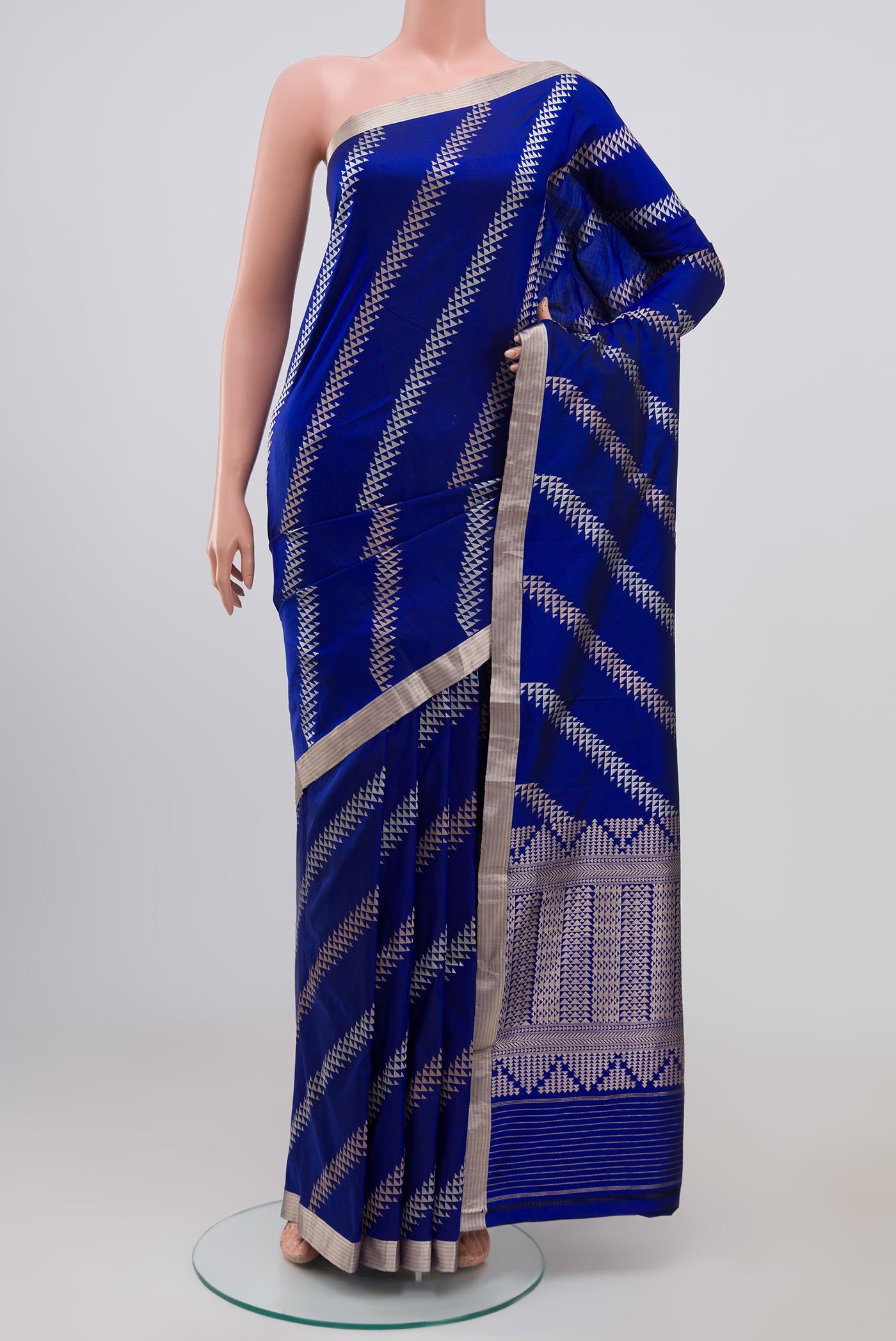 Blue Banarasi Katan Silk Saree with Fancy on the body and Thin Zari Line.  displayed on a mannequin