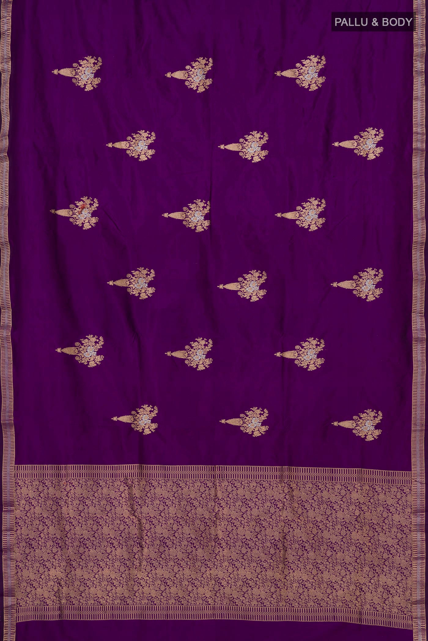 Flat view of Purple Banarasi Katan Silk Saree with Zari Butta on the body and Zari Border. 