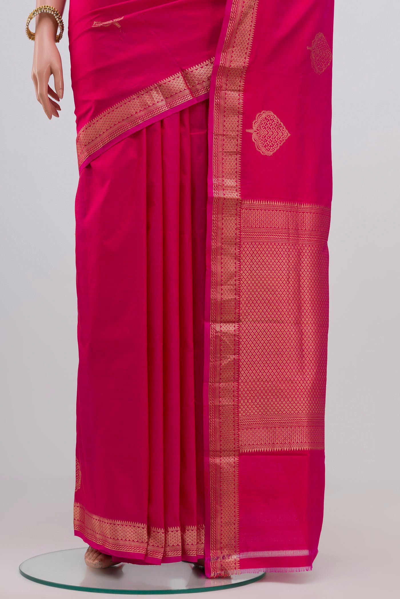 Pleats and pallu of Pink Banarasi Katan Silk Saree with Zari Butta on the body and Zari Border. 