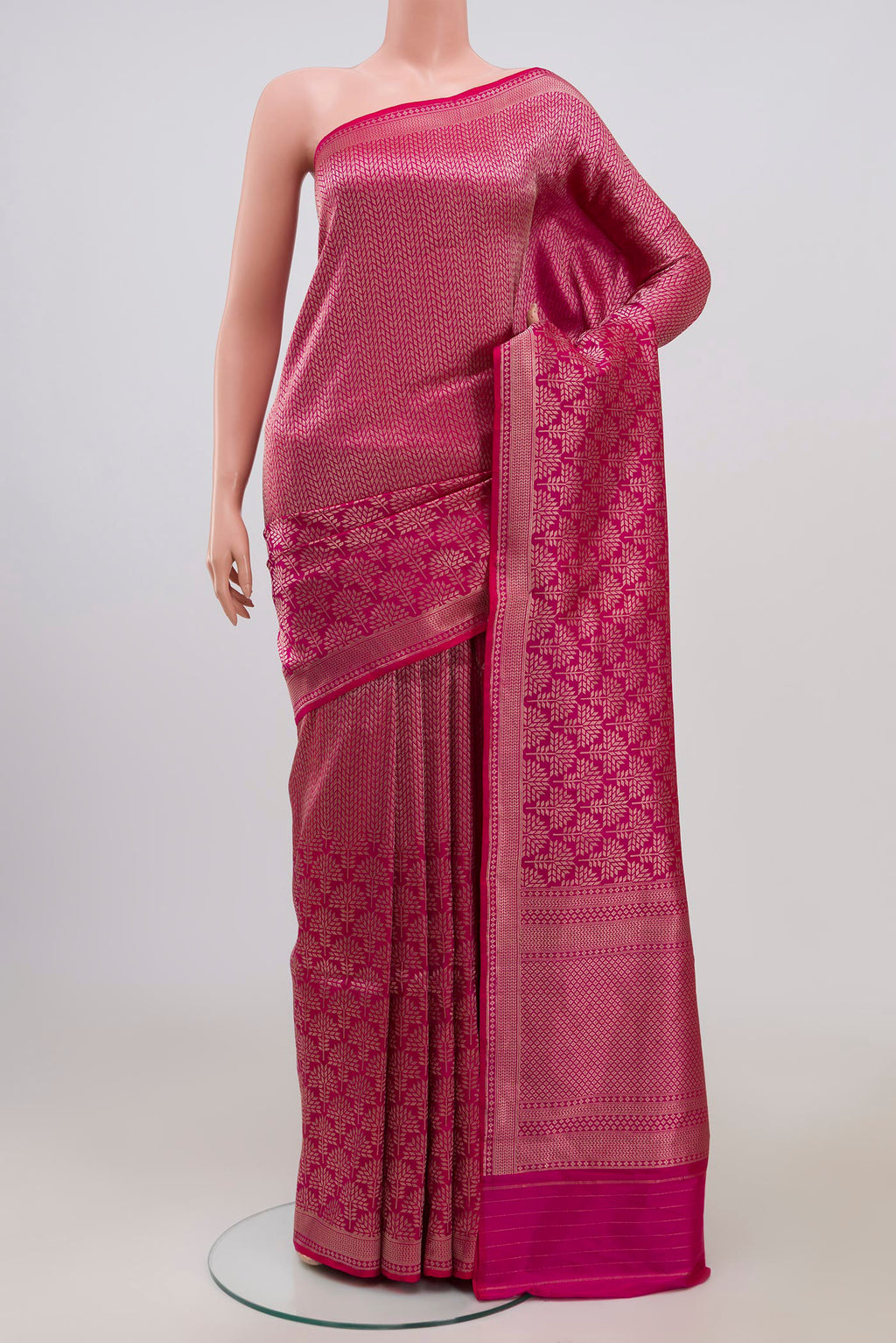 Rani Pink Banarasi Katan Silk Saree with Zari Brocade on the body and Zari Border.  displayed on a mannequin