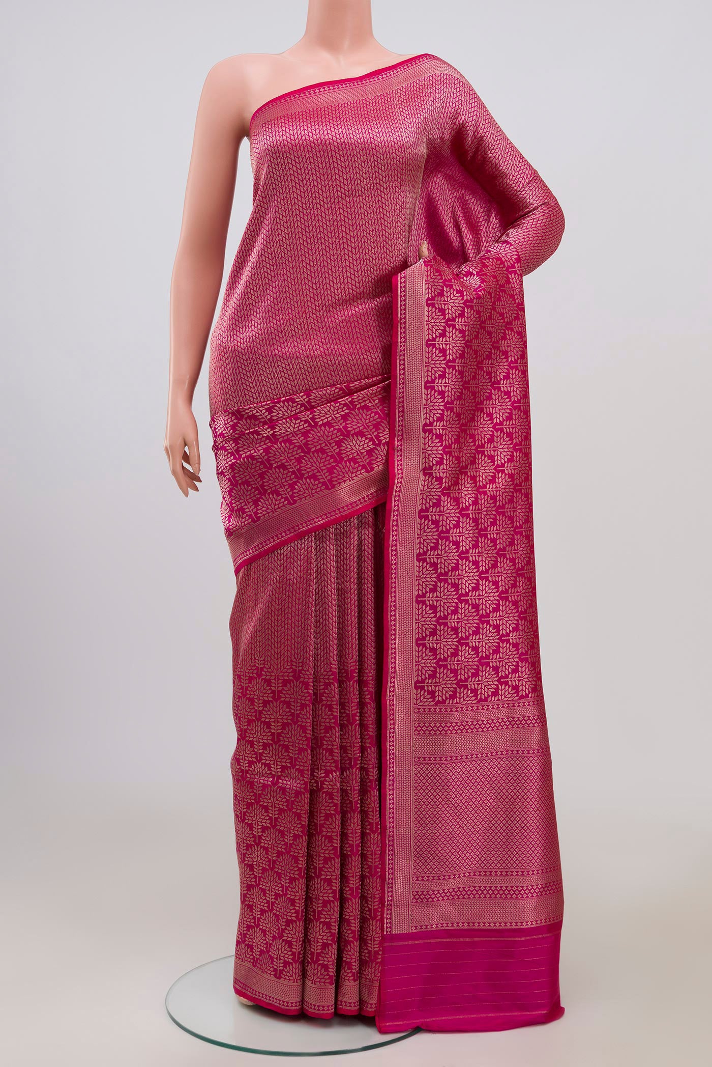 Rani Pink Banarasi Katan Silk Saree with Zari Brocade on the body and Zari Border.  displayed on a mannequin