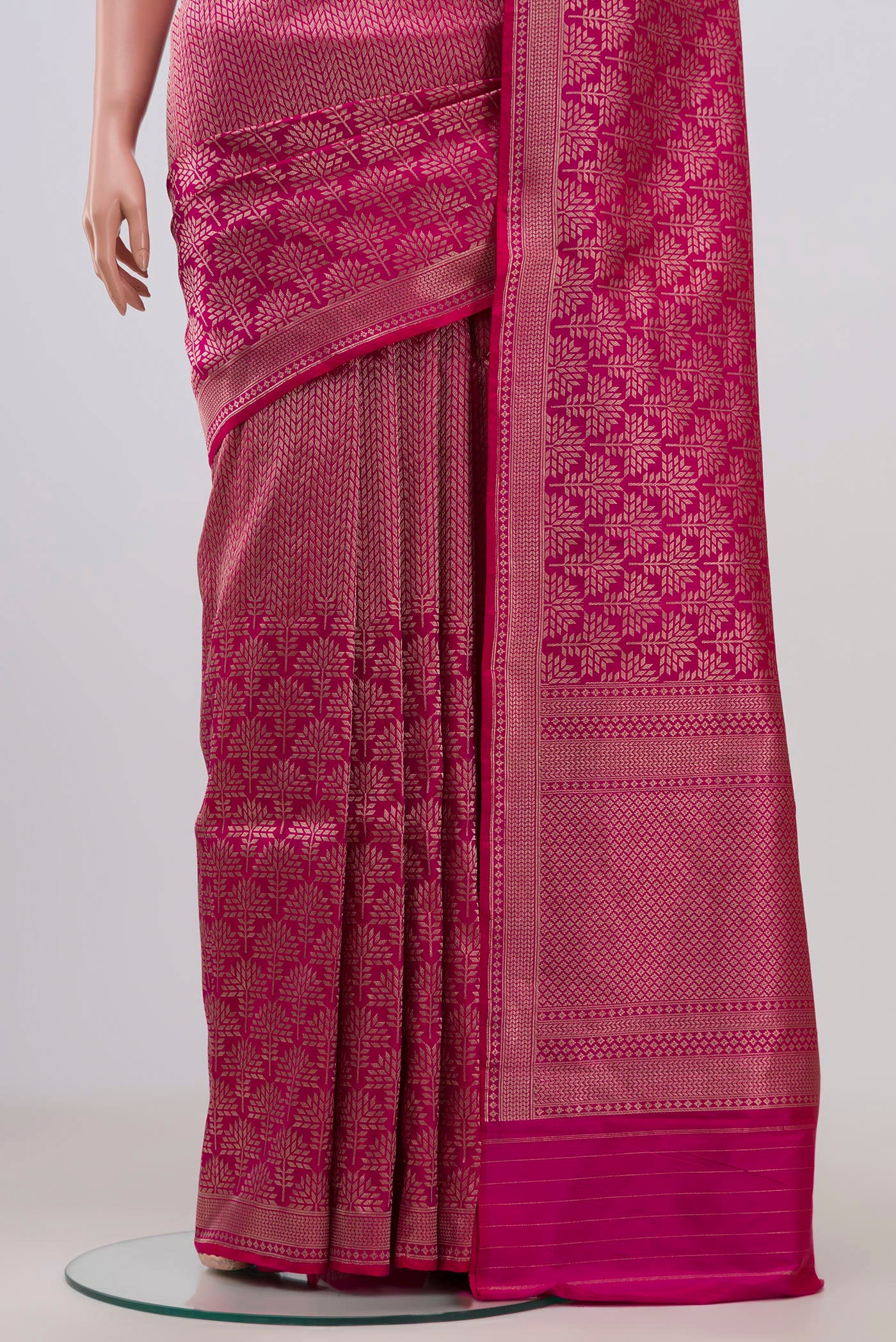 Pleats and pallu of Rani Pink Banarasi Katan Silk Saree with Zari Brocade on the body and Zari Border. 
