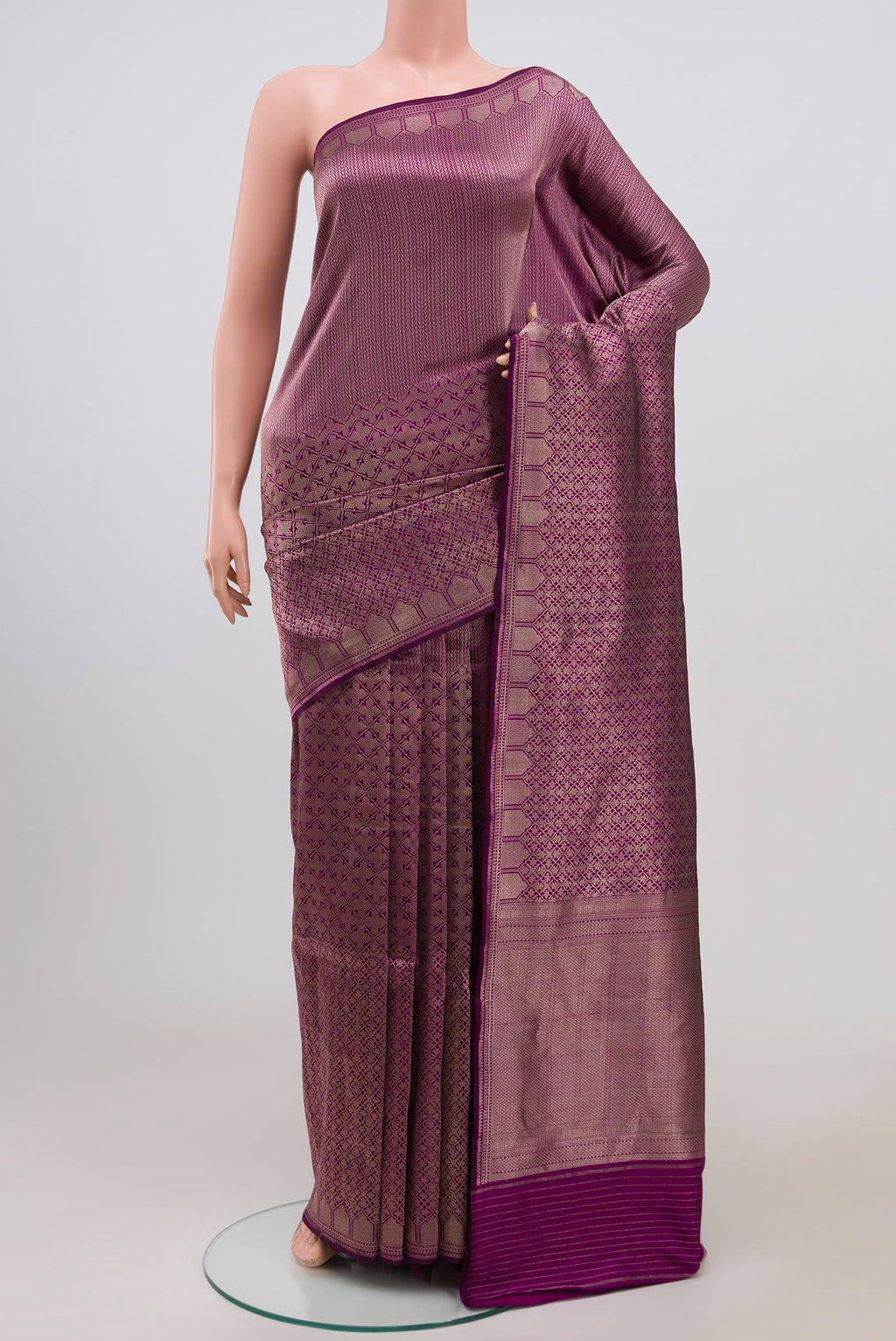 Purple Banarasi Katan Silk Saree with Zari Brocade on the body and Zari Border.  displayed on a mannequin